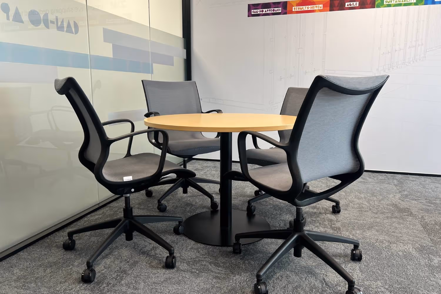 grey mesh meeting chairs on wheels
