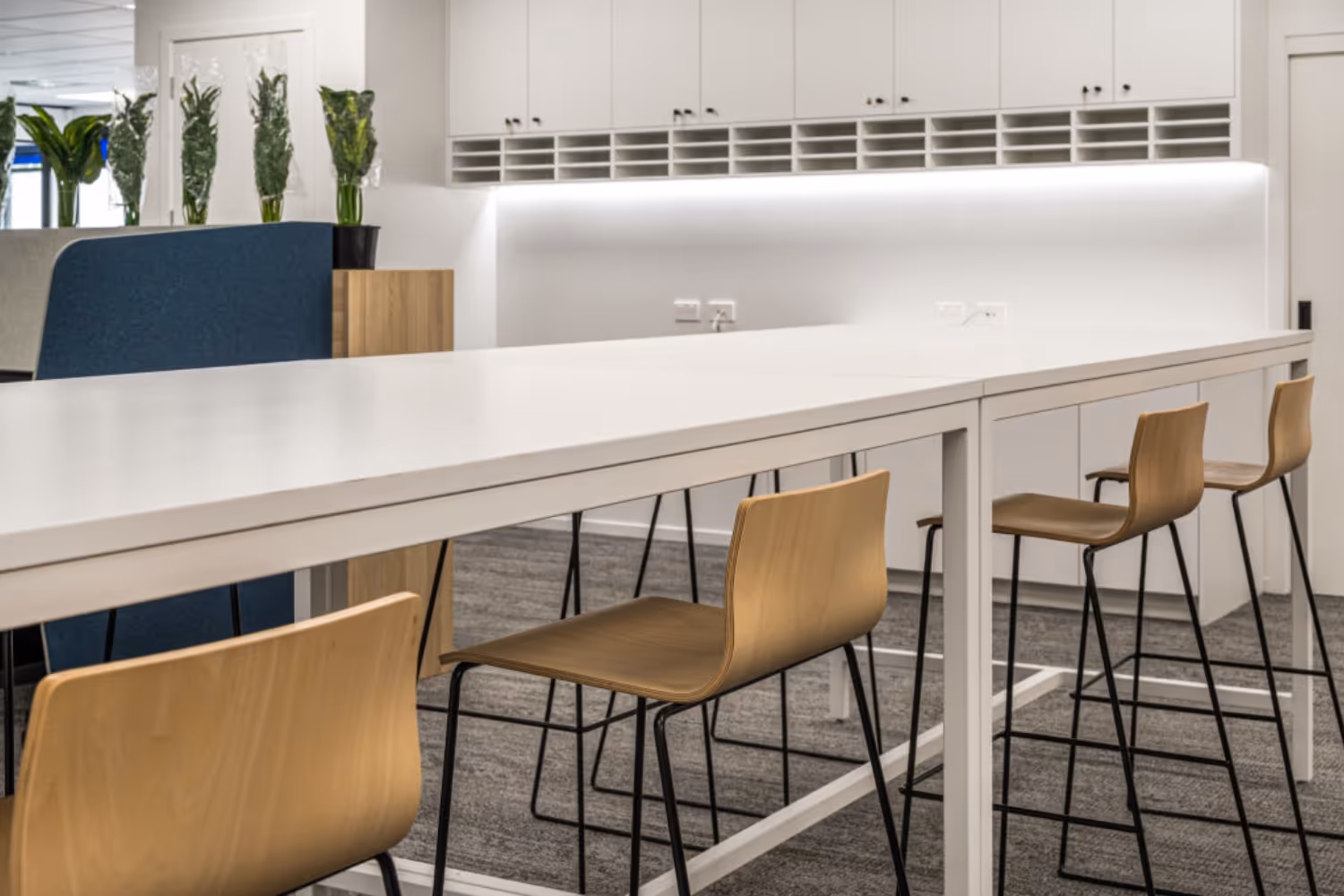 close up high stools with wooden seats