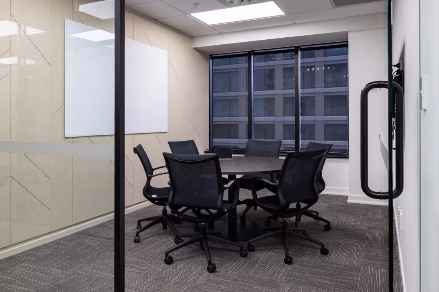 mesh meeting chairs and table