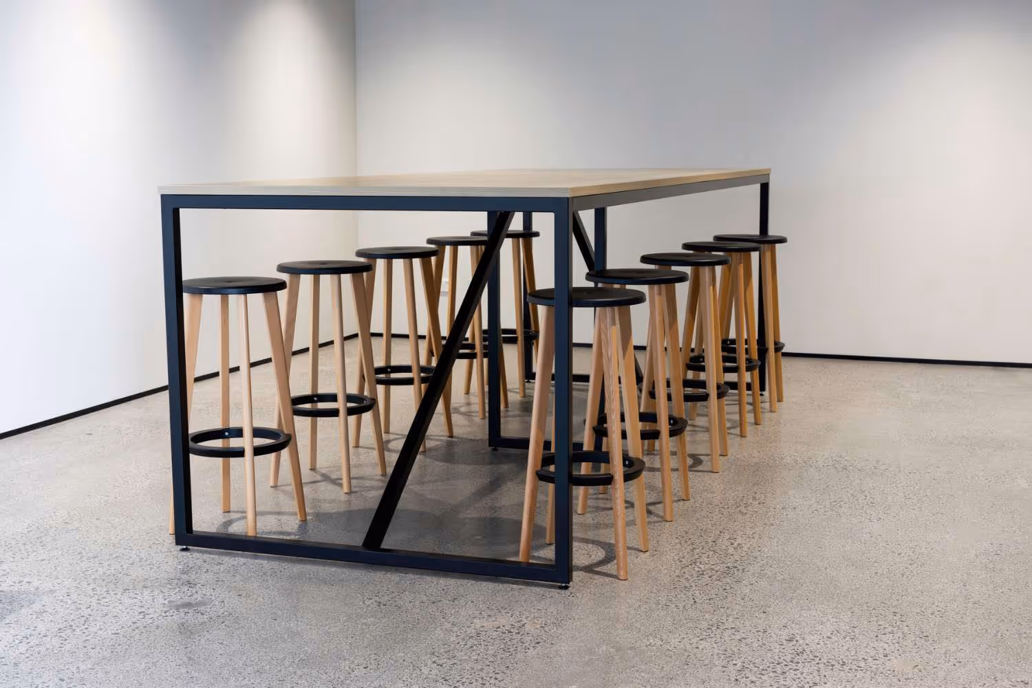timber and black stools and high tables