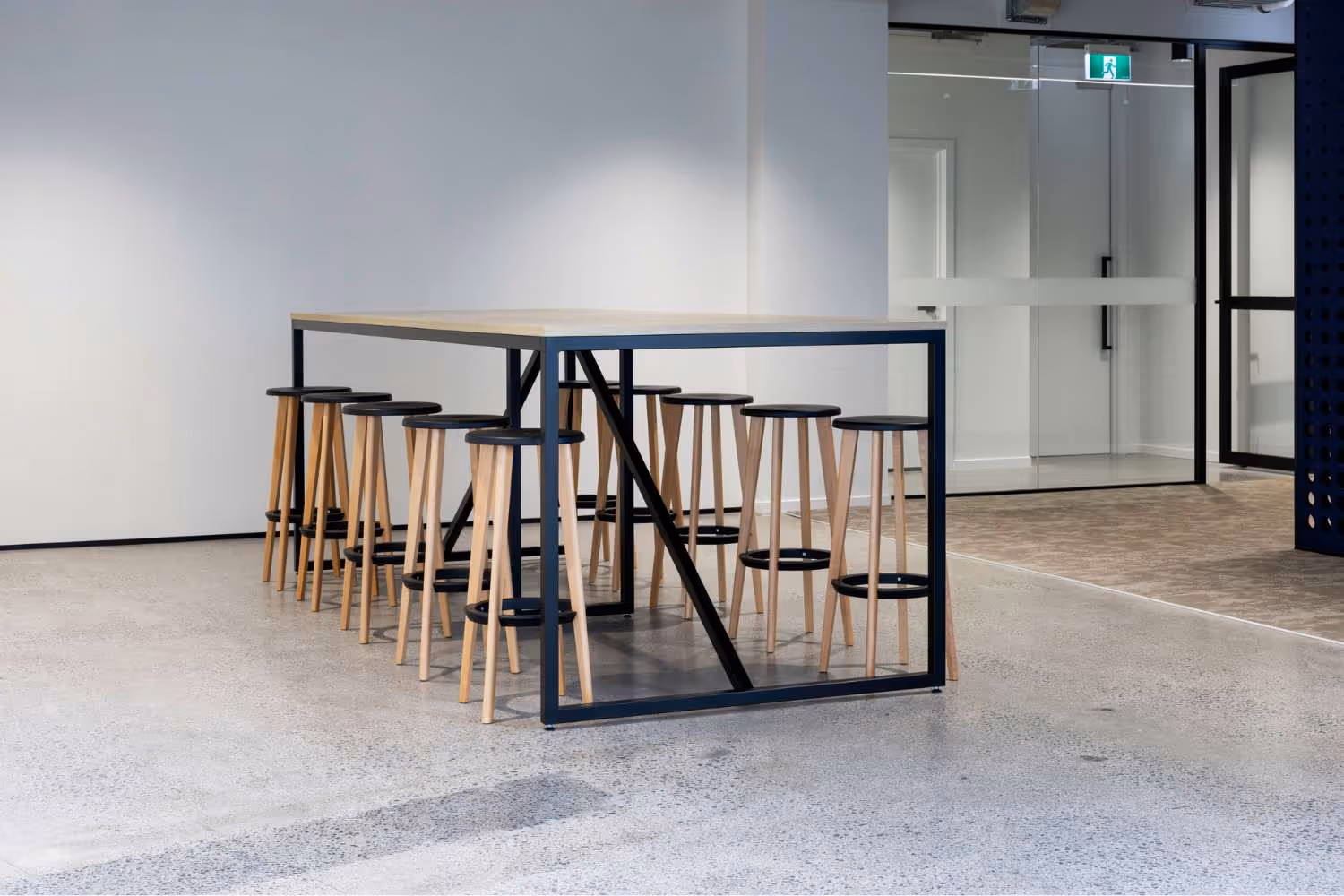 informal meeting area with high table and stools