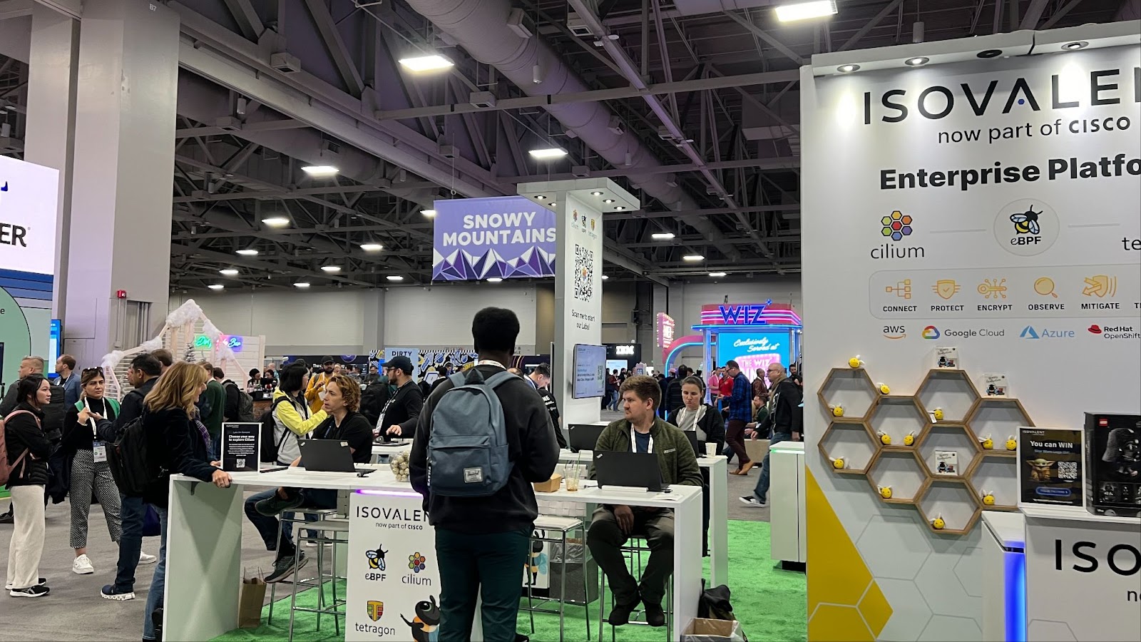 Isovalent (now part of Cisco) booth at a tech conference, showcasing Cilium, eBPF, and Tetragon products.