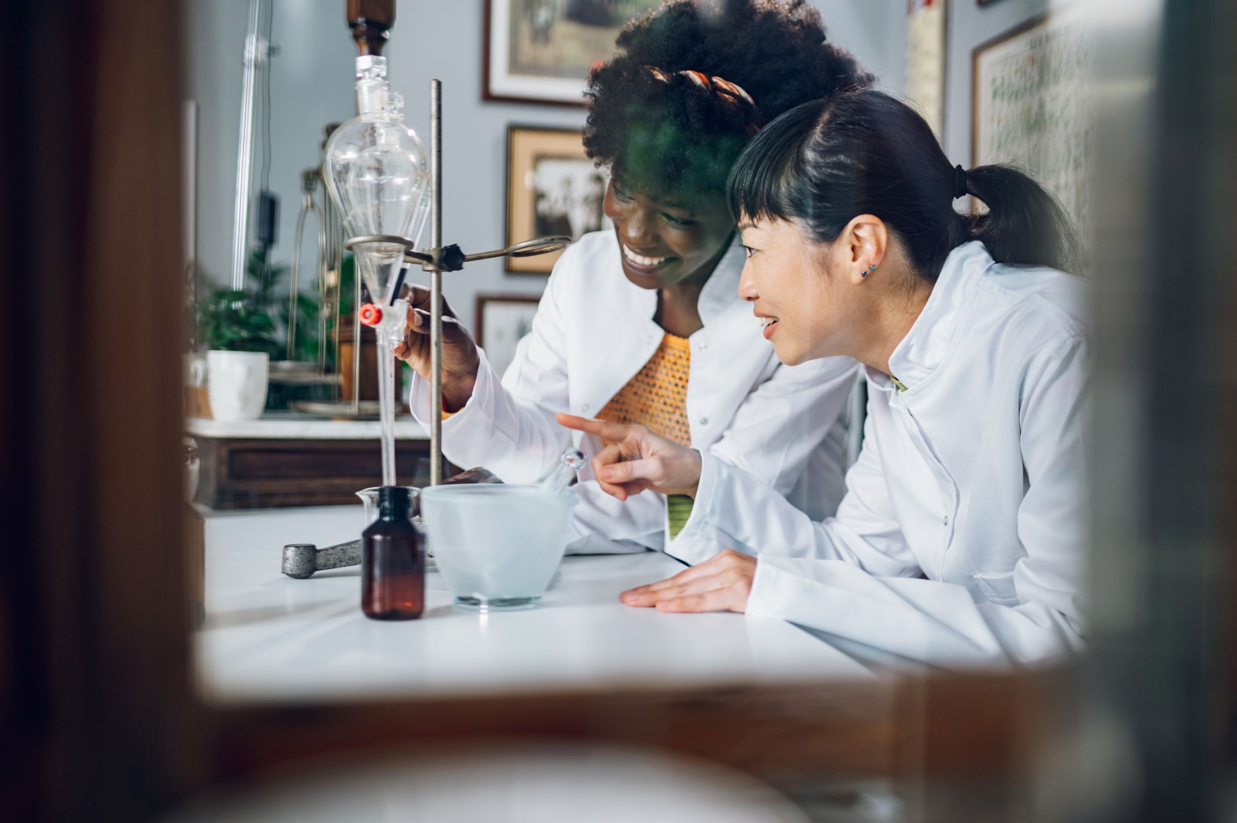 Chemist Professor and a Student in a Lab.