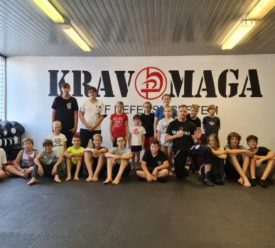 Group photo of the instructor and children