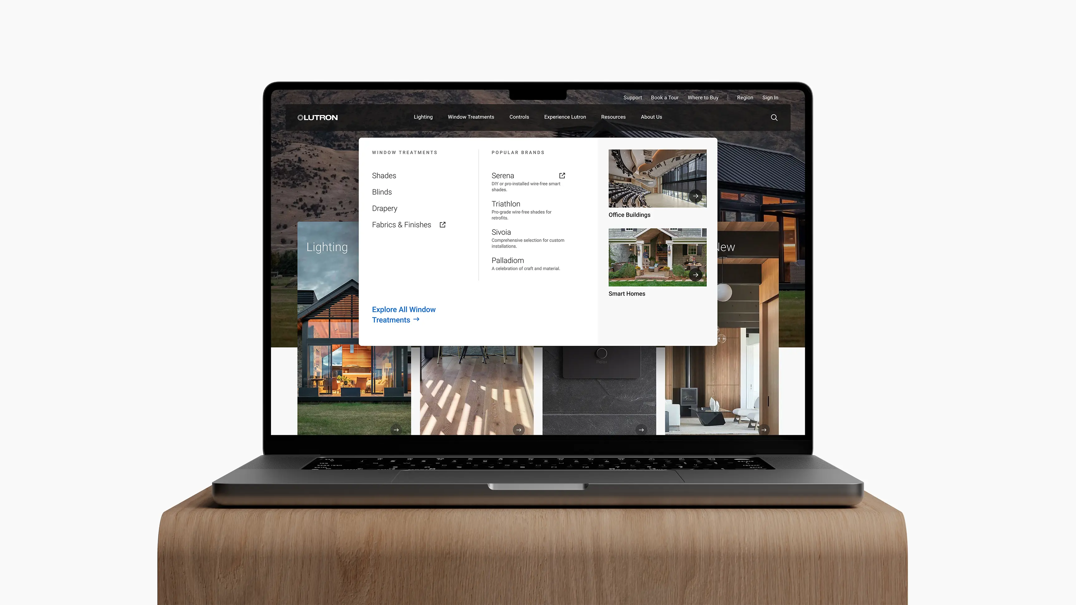 Laptop mockup showing Lutron homepage built with the new design system, displaying consistent navigation and layout