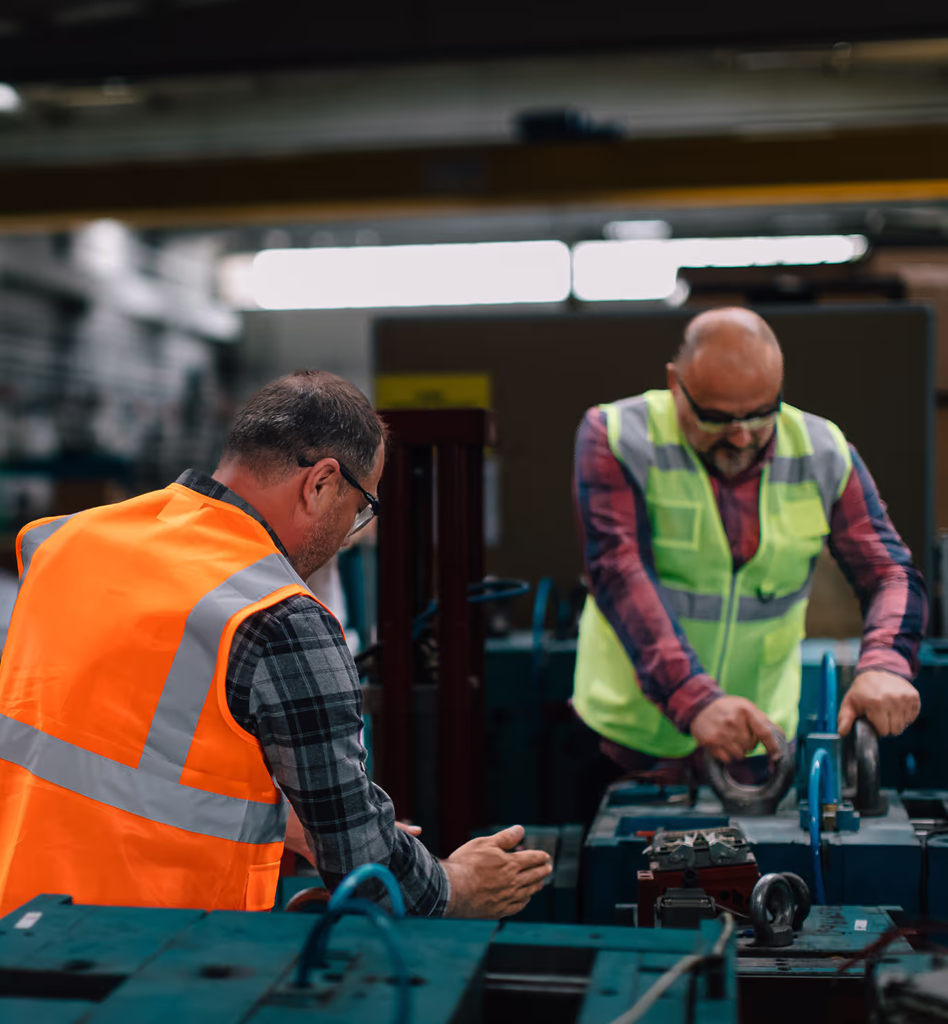 Engineer's working on a machine