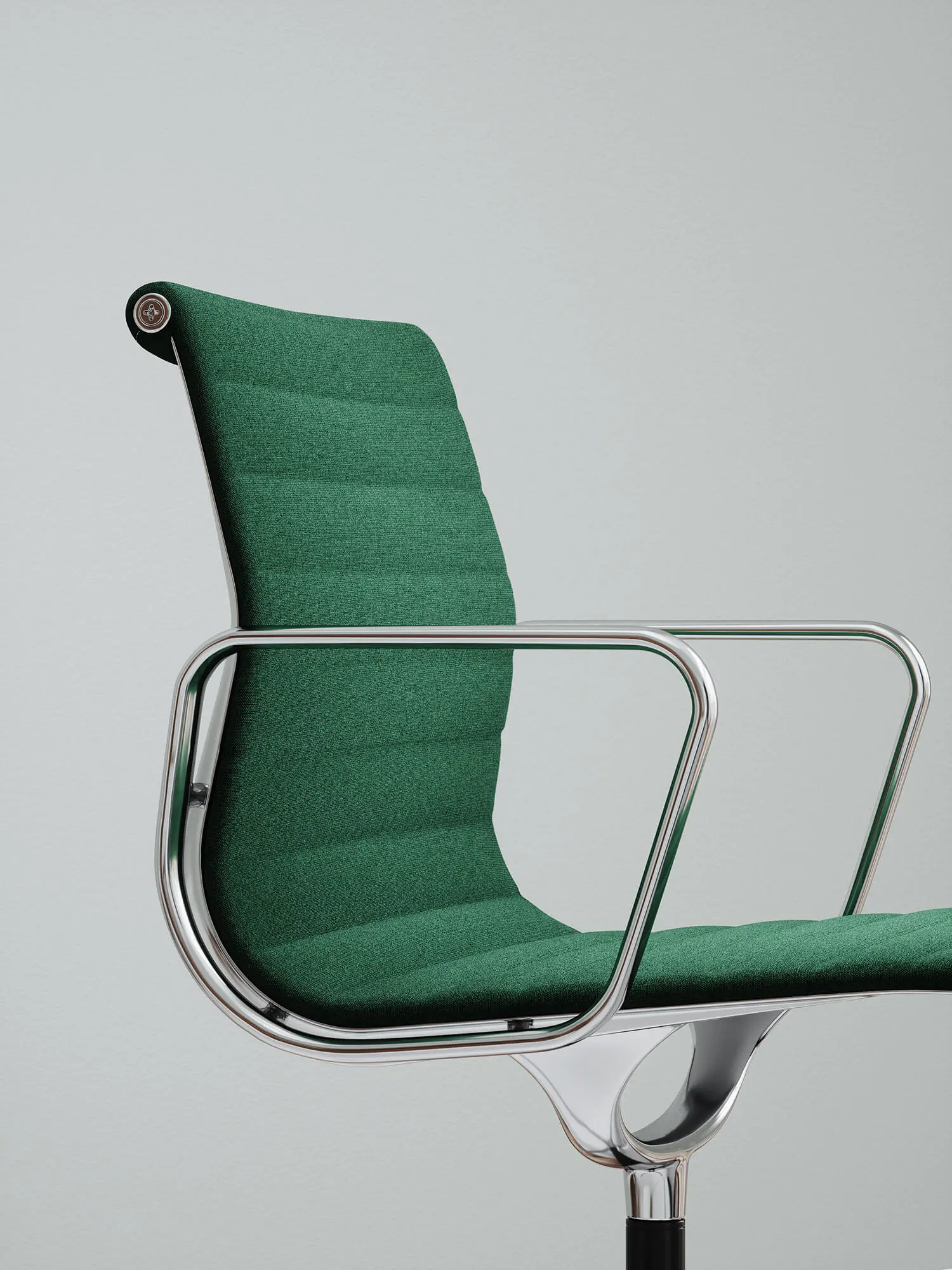 Dettaglio della trama del tessuto Kvadrat sulla Vitra Aluminium Chair EA in verde.