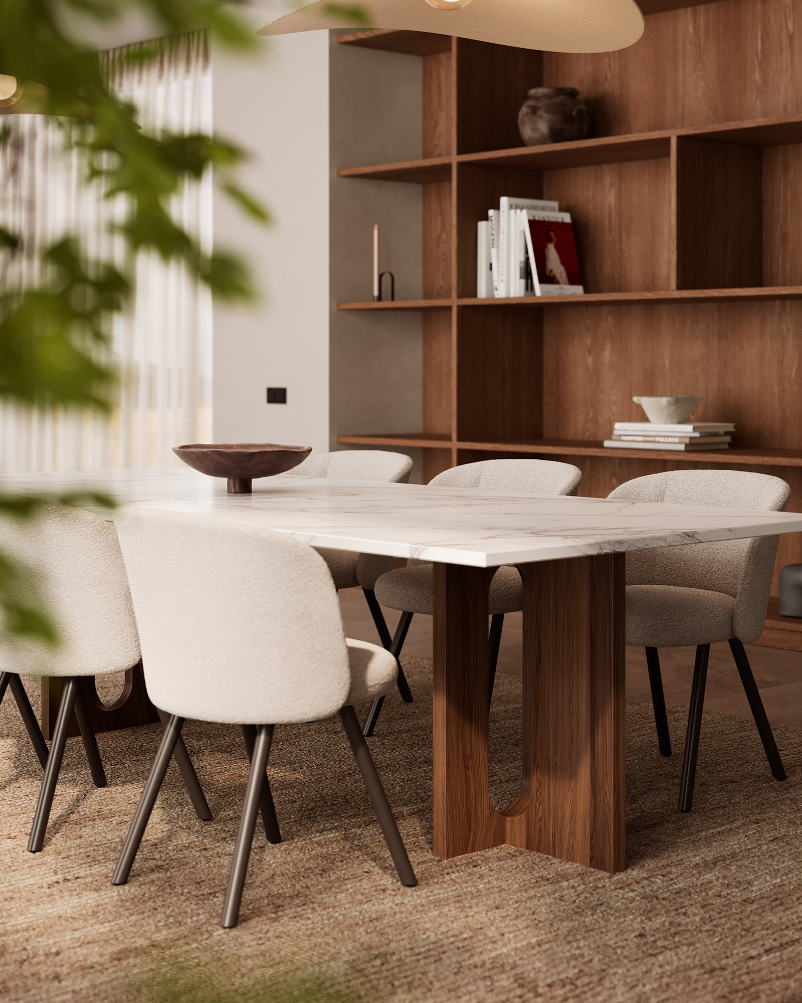 Dining table with a light-colored top and upholstered chairs in front of a wooden wall