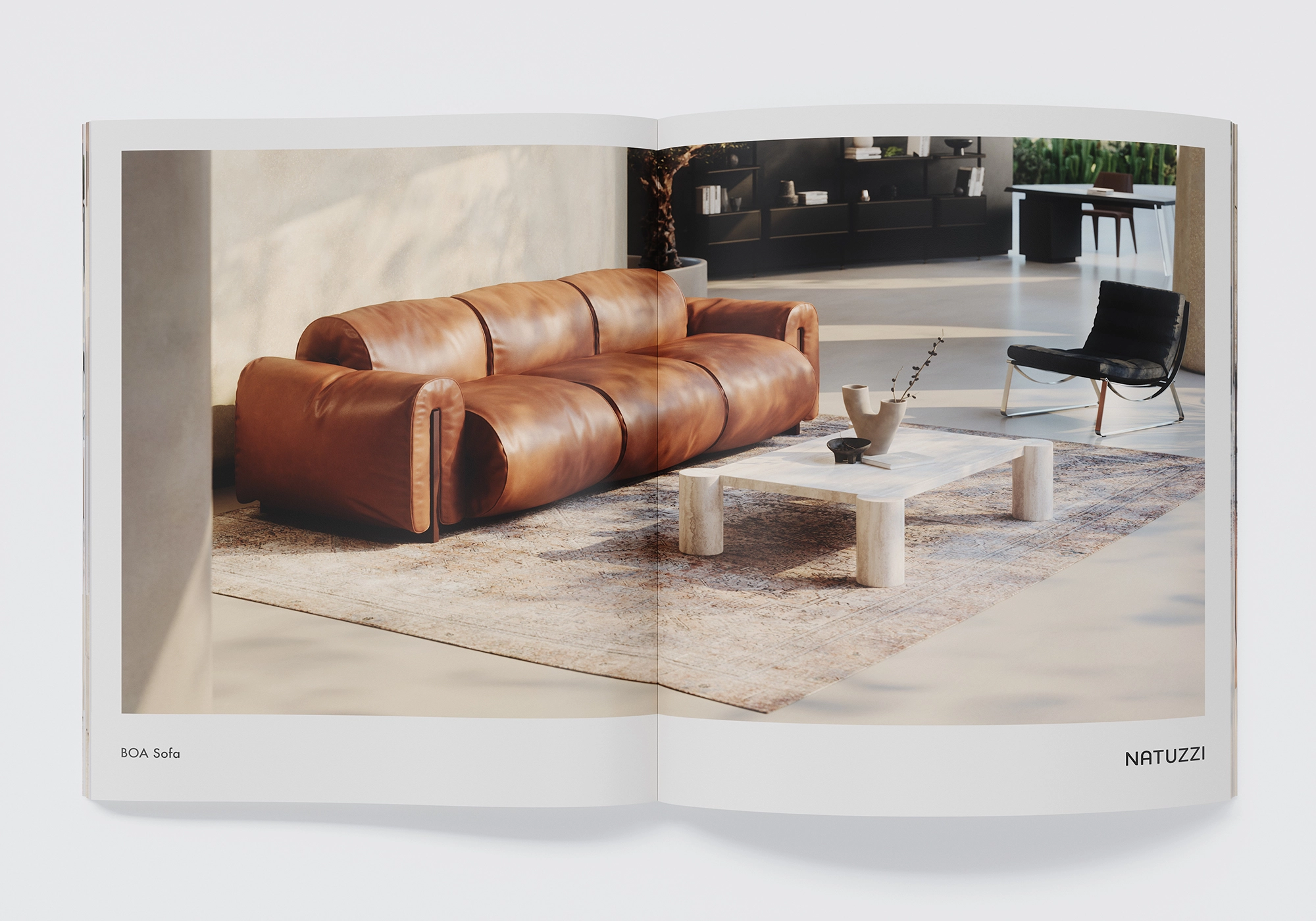 3D furniture visualization for manufacturers & brands: Natuzzi BAO leather sofa in a bright brand space with travertine coffee table - photorealistic 3D furniture visualization & interior rendering for catalogs, online store and digital marketing.