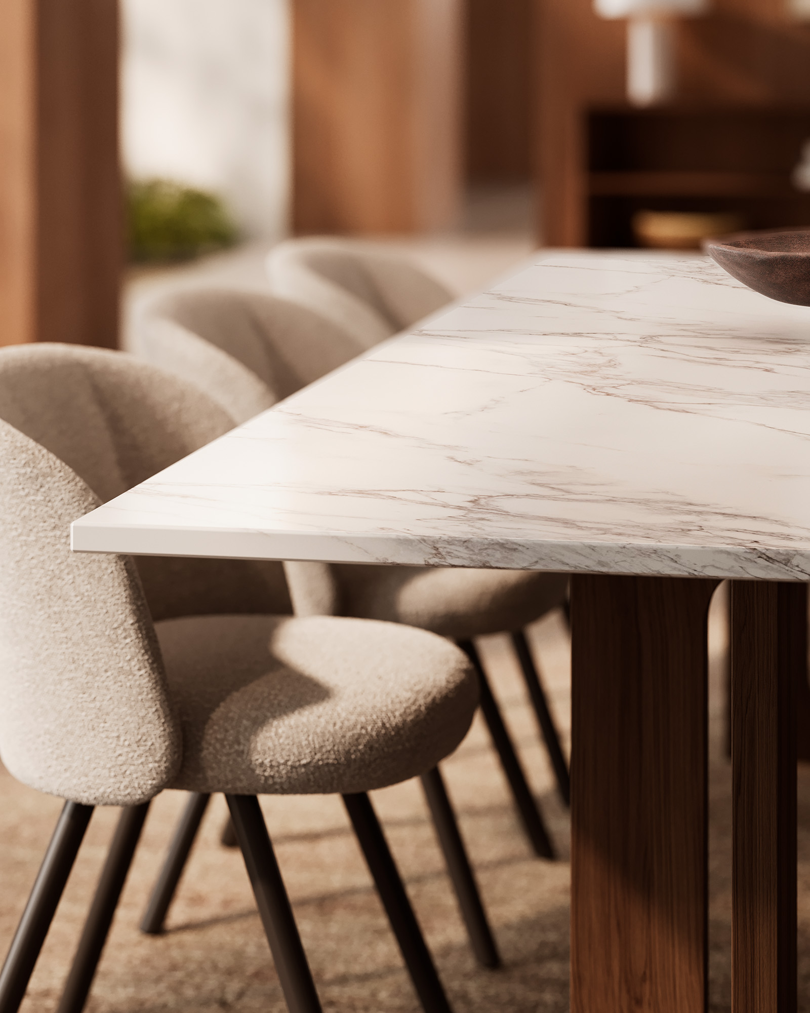 A table with a veined edge next to a light-colored upholstered chair and a wooden base