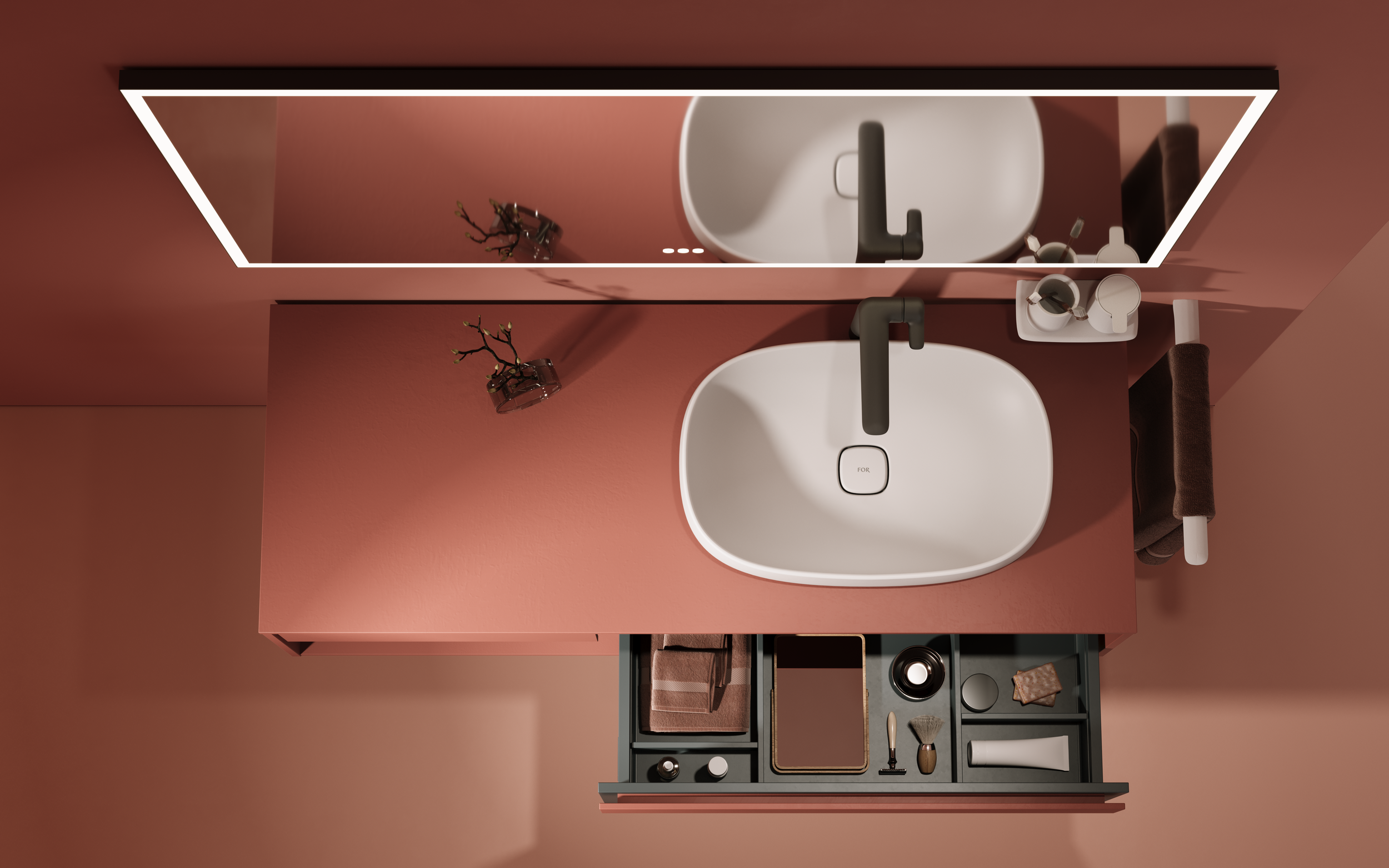 Vista dall'alto di un mobile lavabo FOR-Odivis con cassetto aperto e scomparti a vista per gli accessori da bagno.
