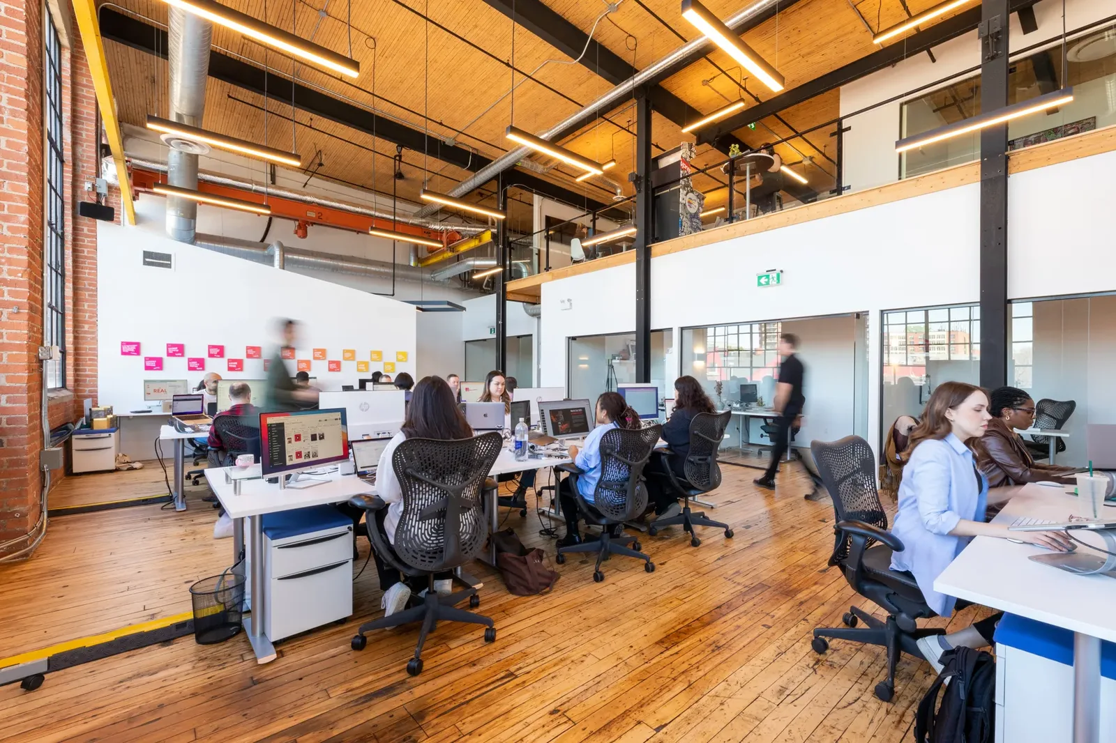Marketing specialists at work on the TIA studio floor in Toronto