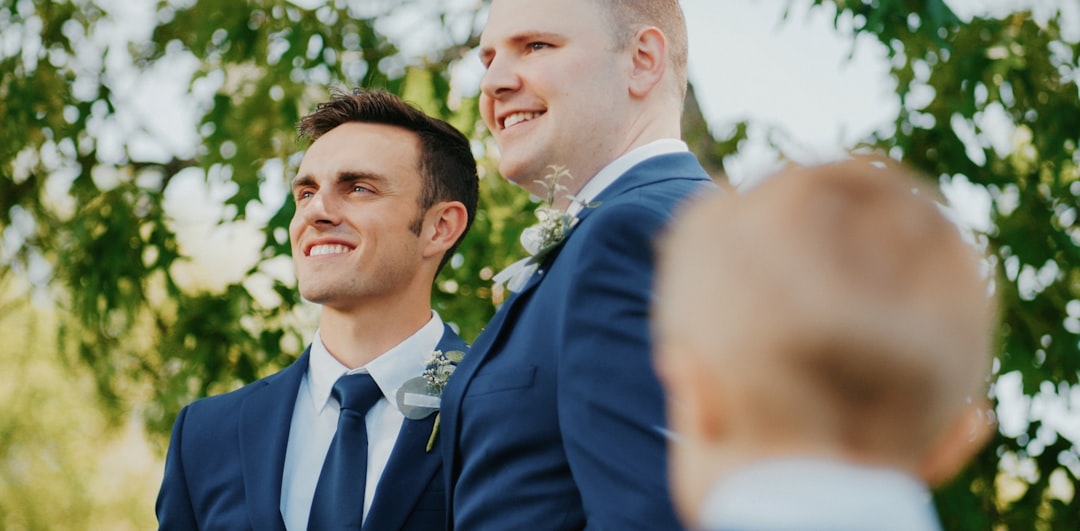 a couple of men standing next to each other