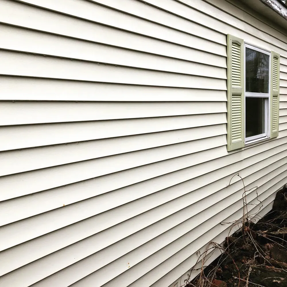 Home vinyl siding in Wheeling after having professional soft washing service.