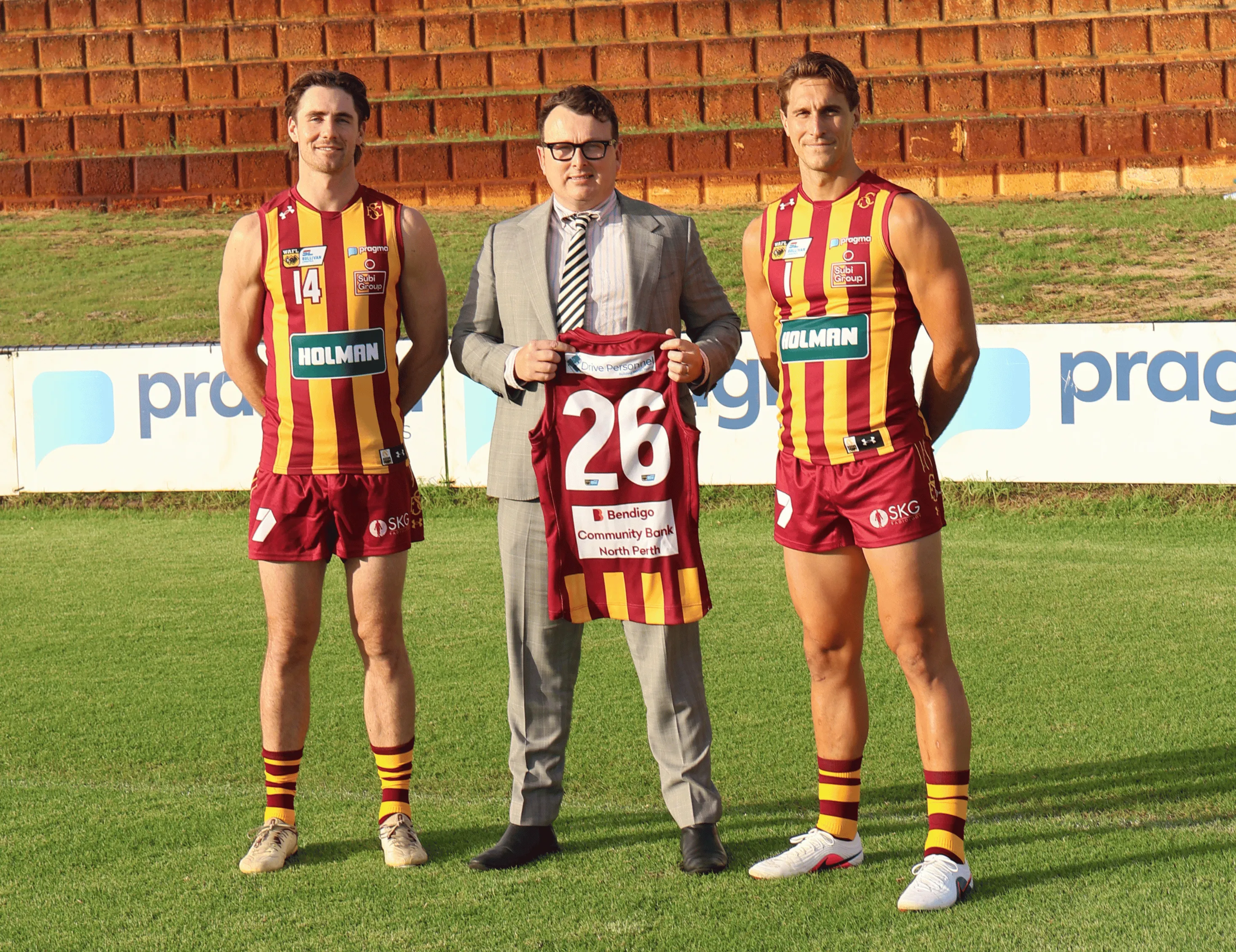 Pragma Lawyers with Subiaco Football Club players holding a club jumper
