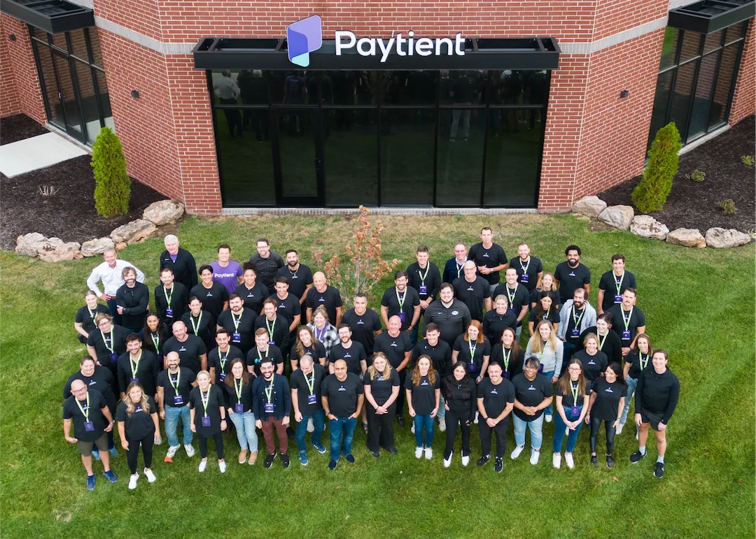 Paytient Team standing outside of home office in Colombia, MO