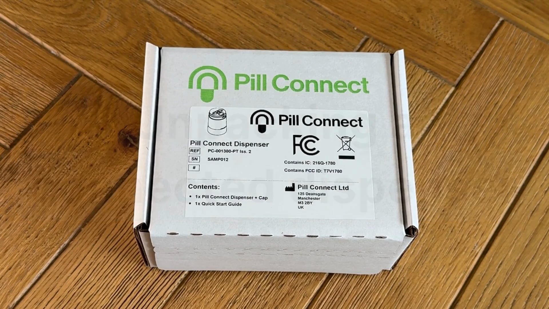 Thumbnail for unboxing video, showing a pill connect dispenser in its box