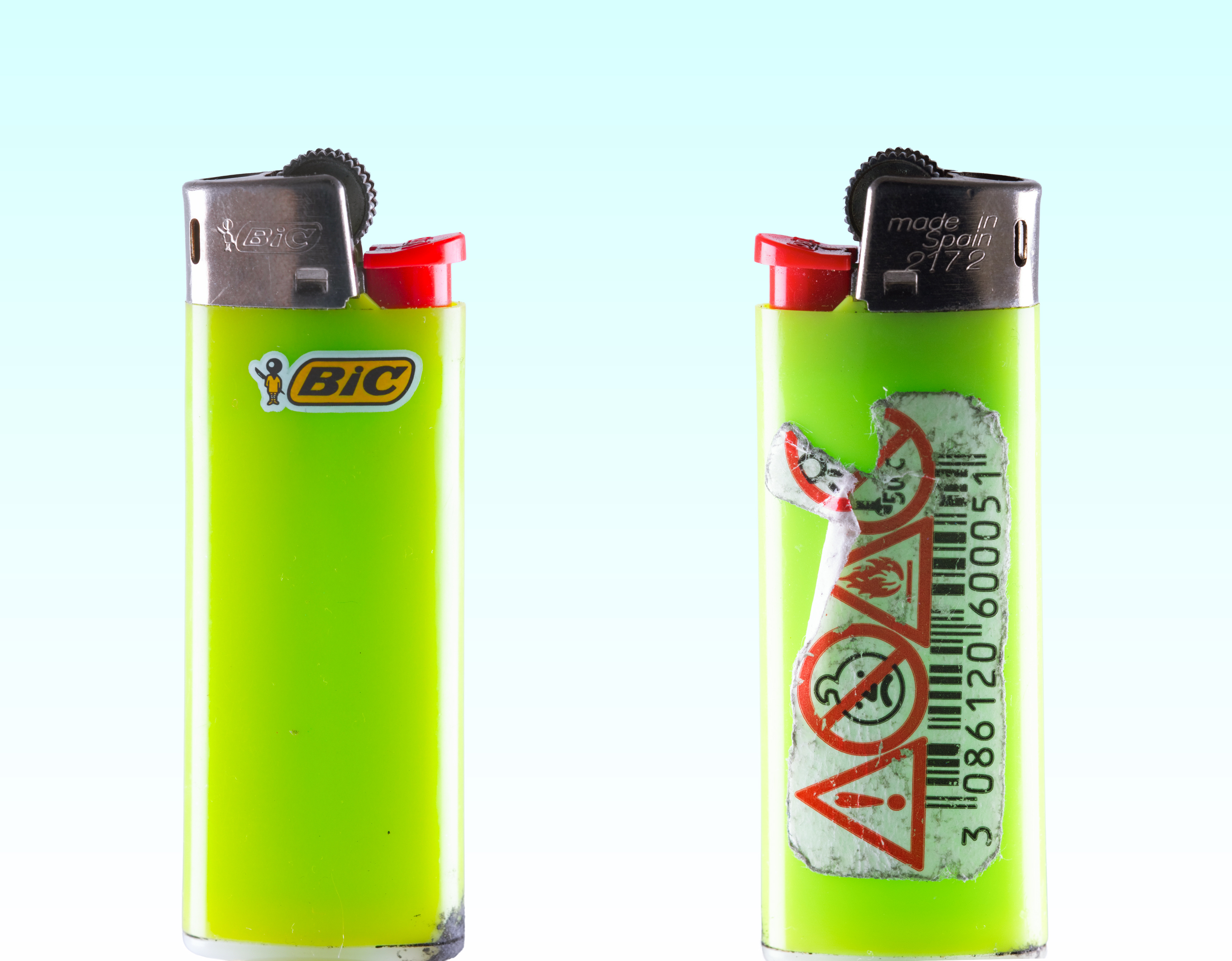 Front and back views of a green Bic lighter with a red ignition button and safety warning label.