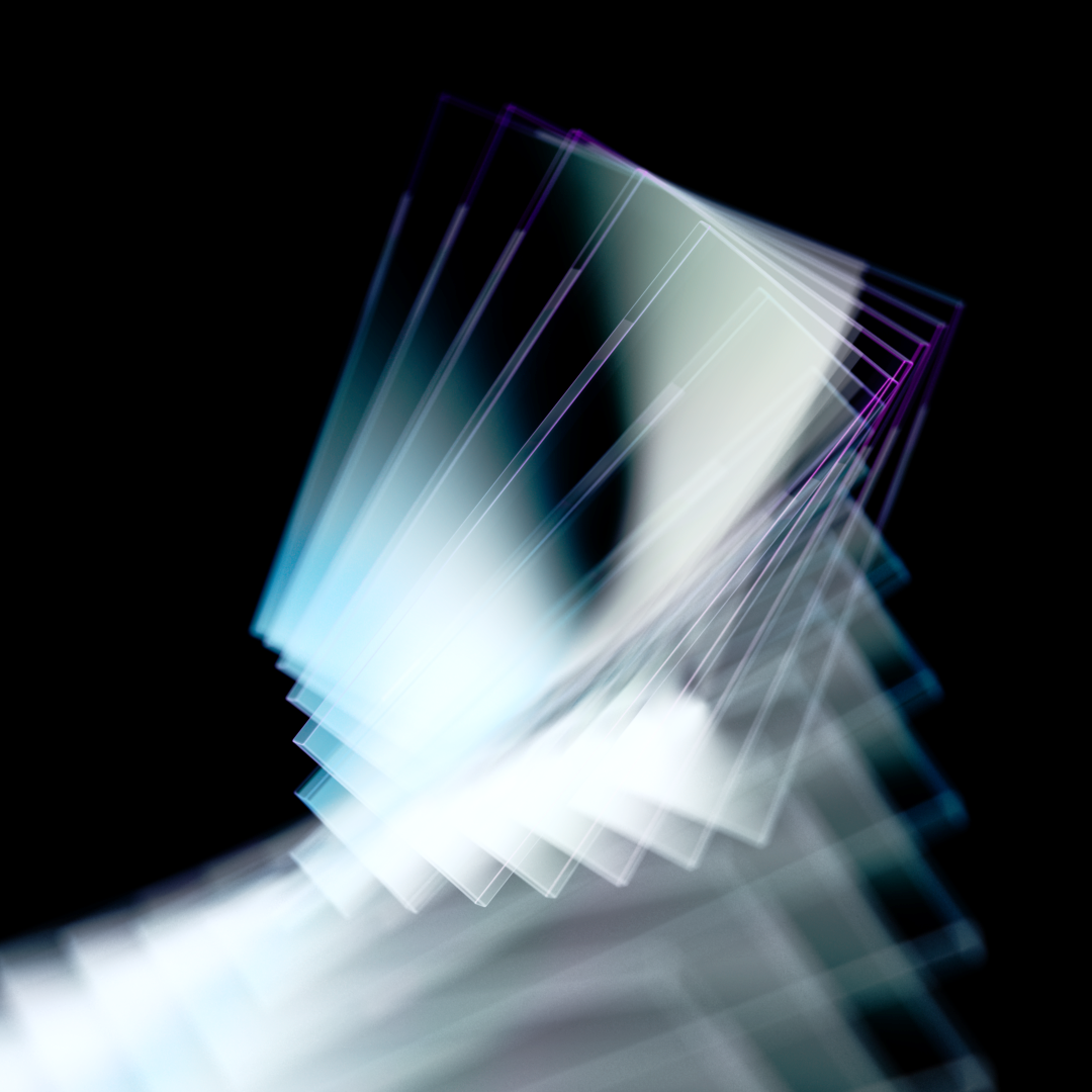 Abstract close-up of delicate, curved, multicolored light trails against a black background.