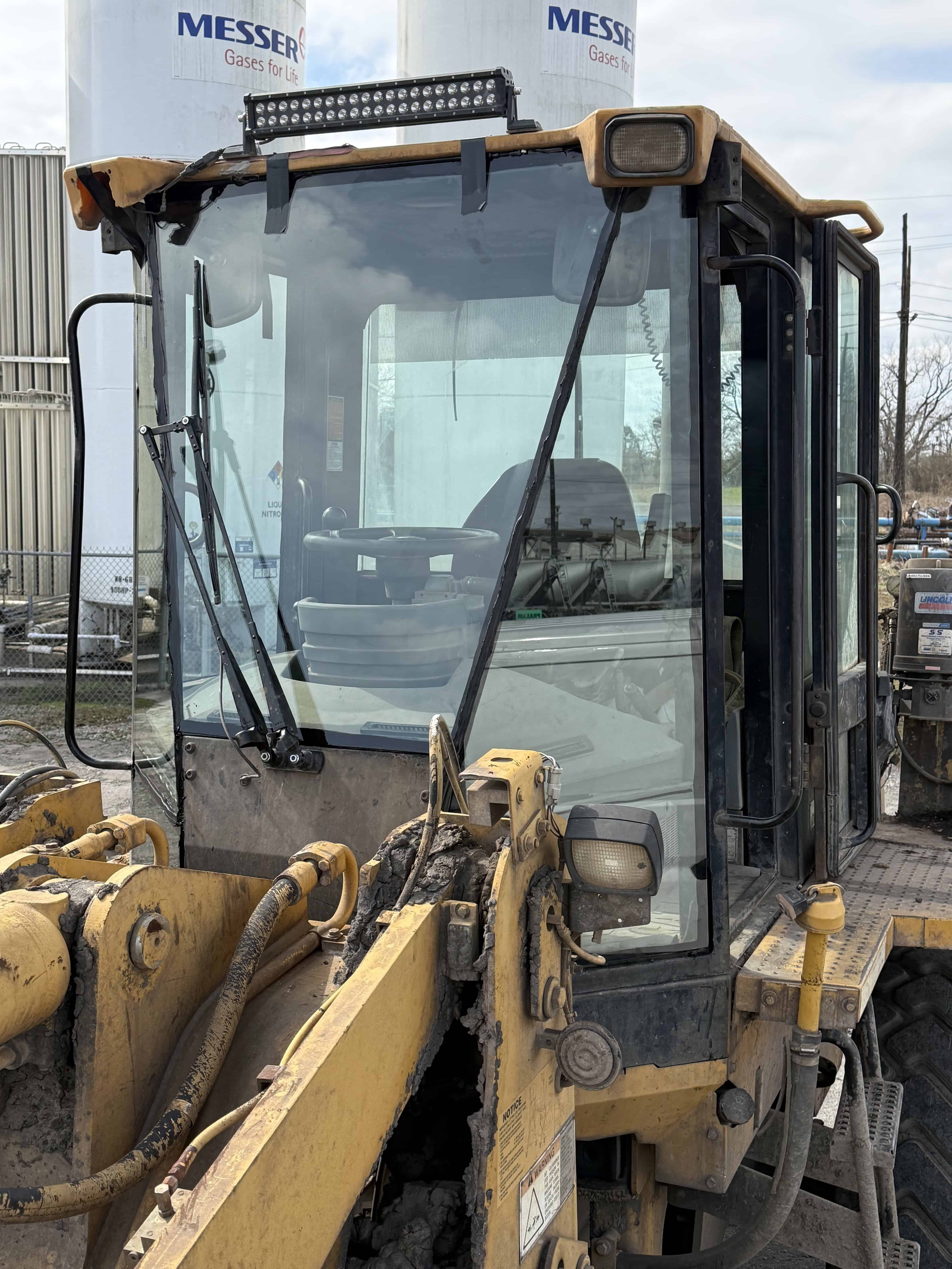 Crack in windshield while vehicle driving down the road.