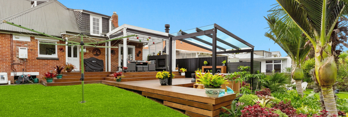 Backyard design and build with hot tub, pergola, decking, fencing, and landscaping