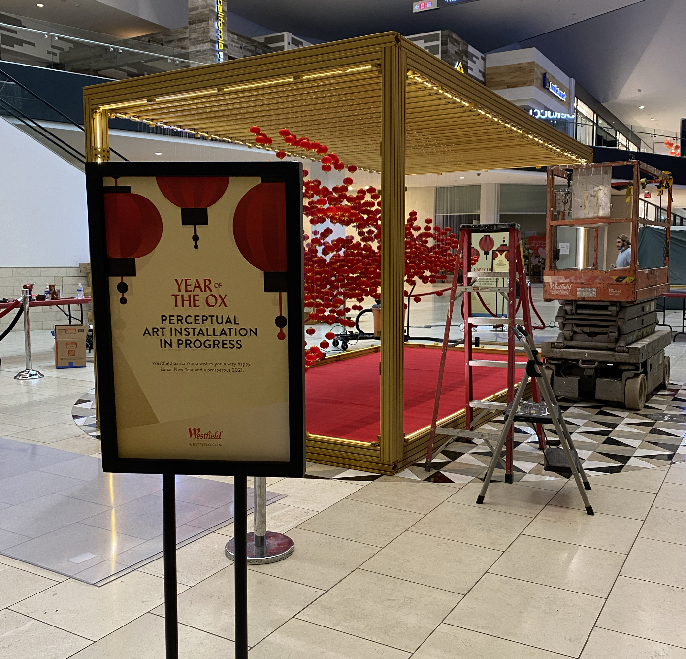 A signage in a mall depicting lunar new year ox