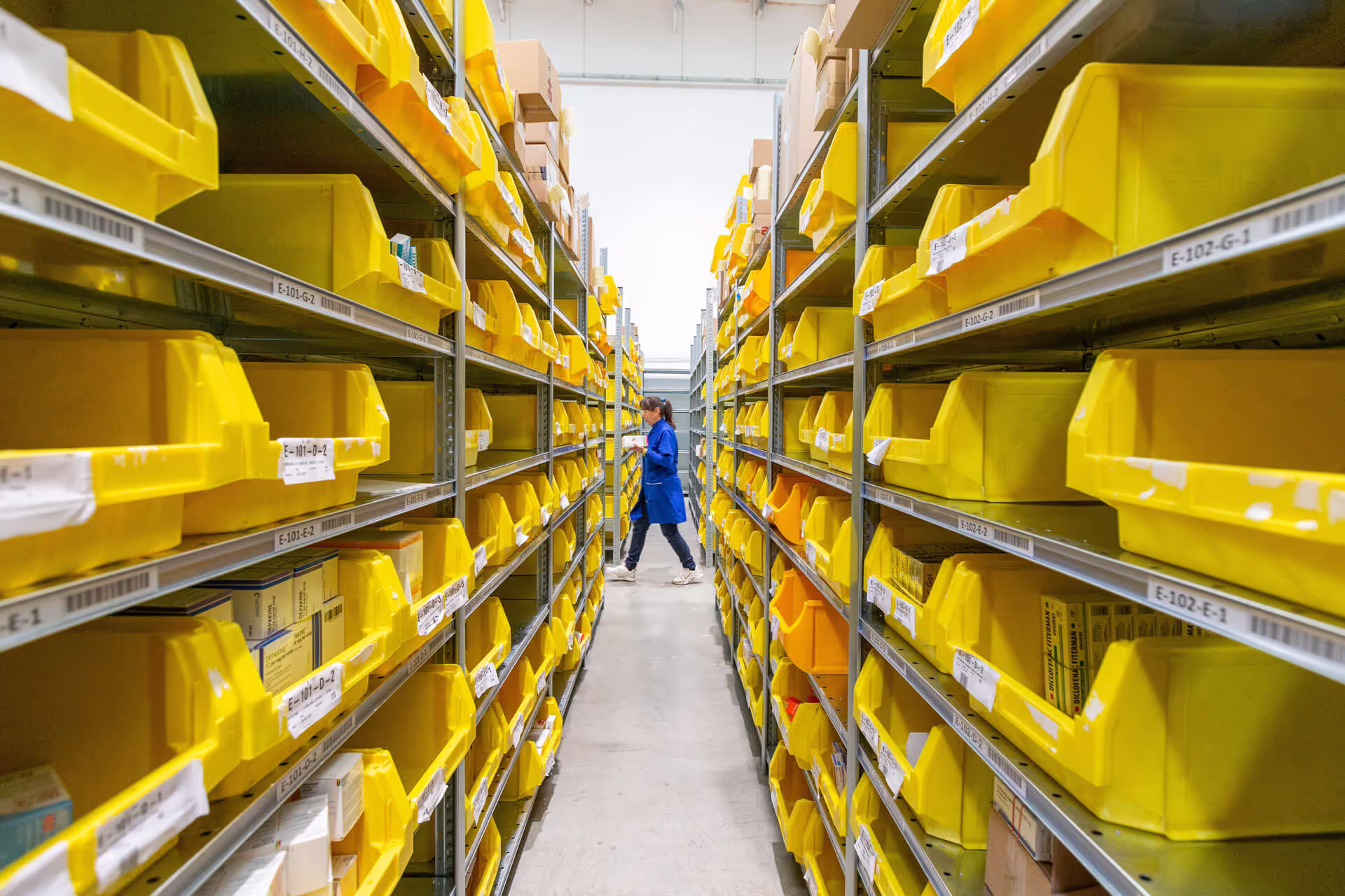 A warehouse of yellow crates