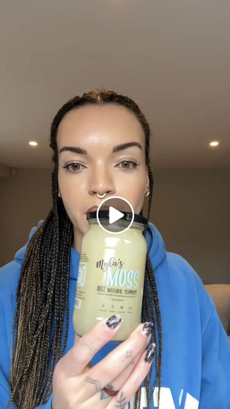 Creator post: holding a jar of Myla's Moss