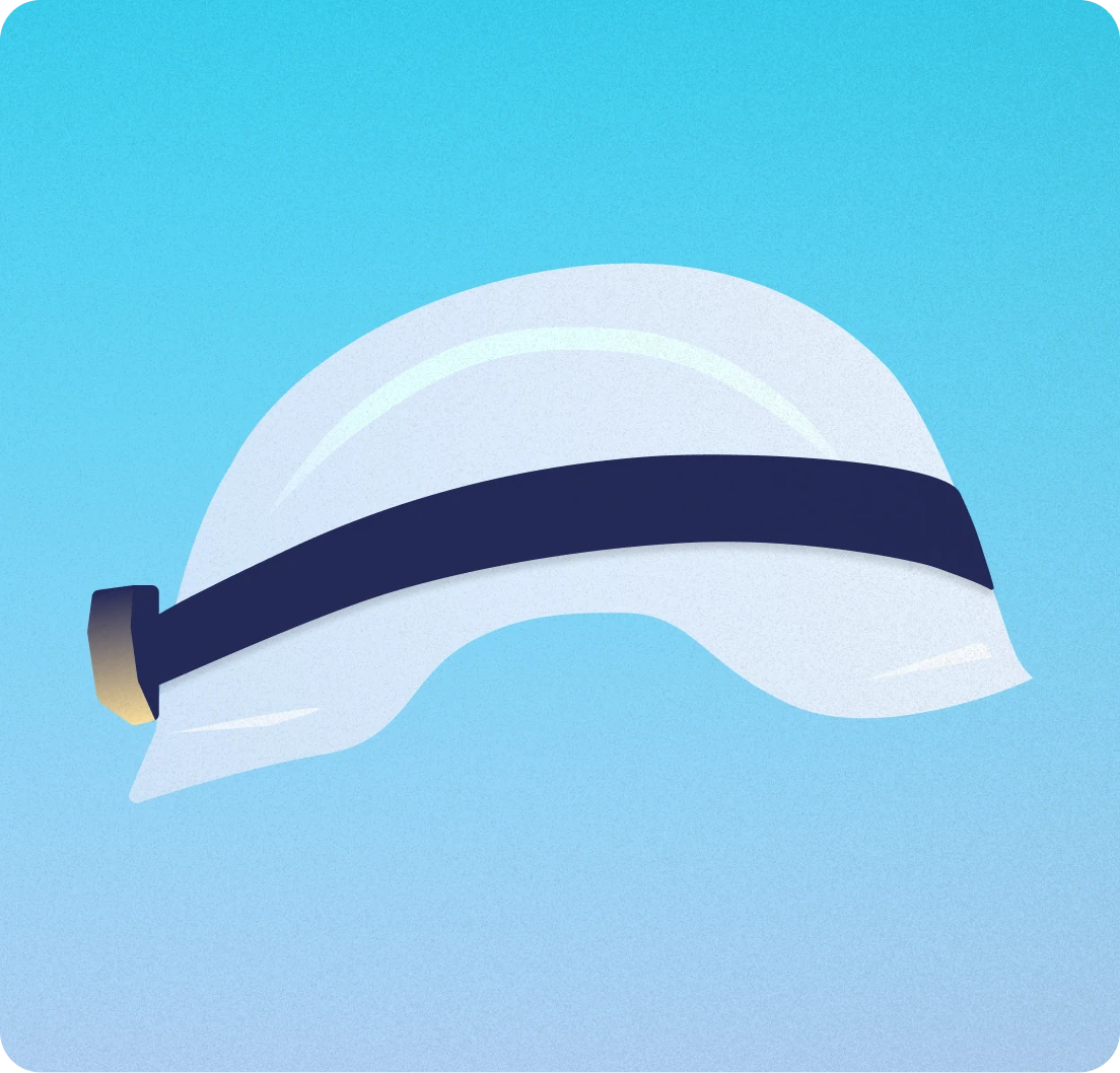 A white hard hat with a torch on it