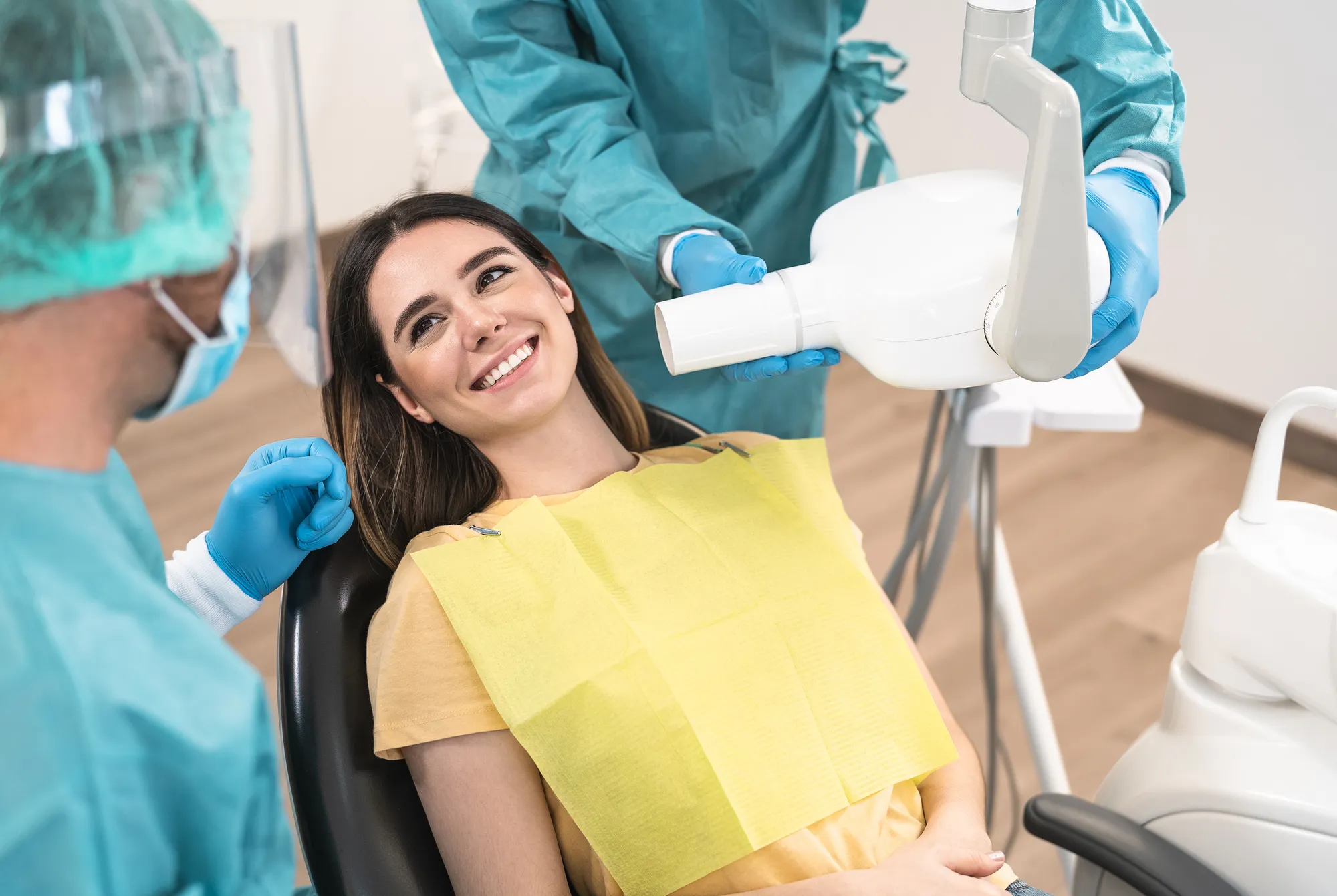 Dental patient receiving care during an oral surgery procedure