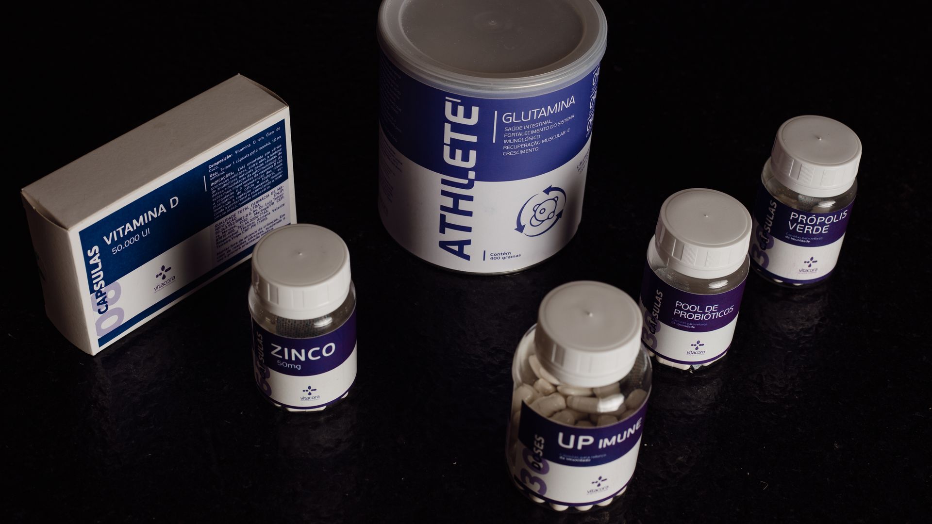 Assortment of nutritional supplements, vitamins, and probiotics, representing supplement fulfillment