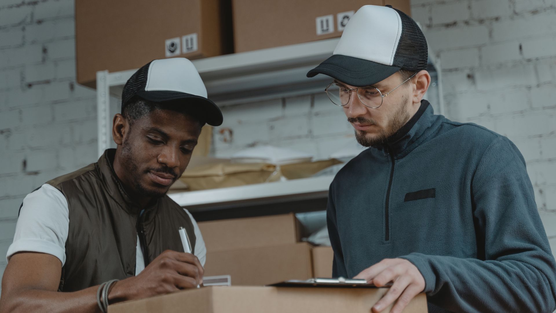 Fulfillment team processing outbound deliveries in a warehouse during peak season