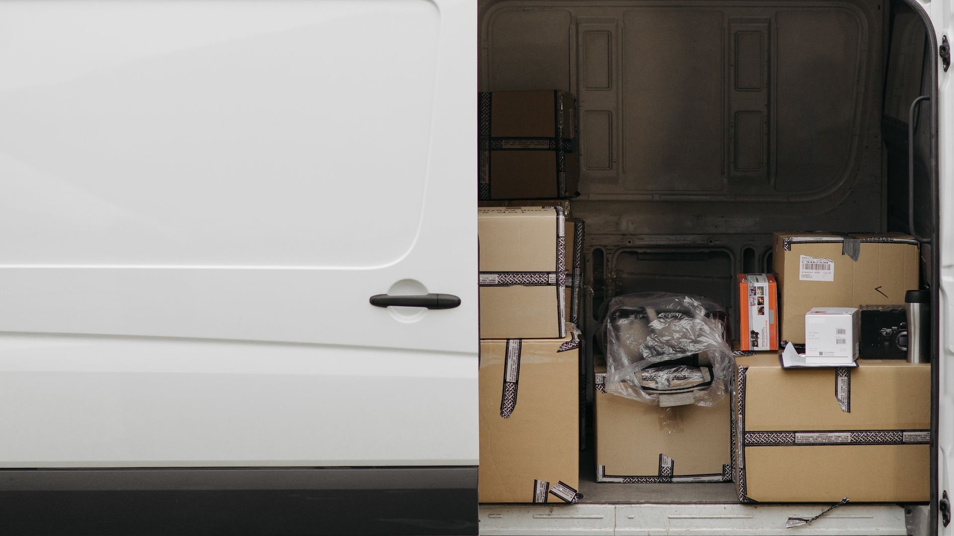 Delivery van loaded with parcels ready for back-to-school ecommerce shipping