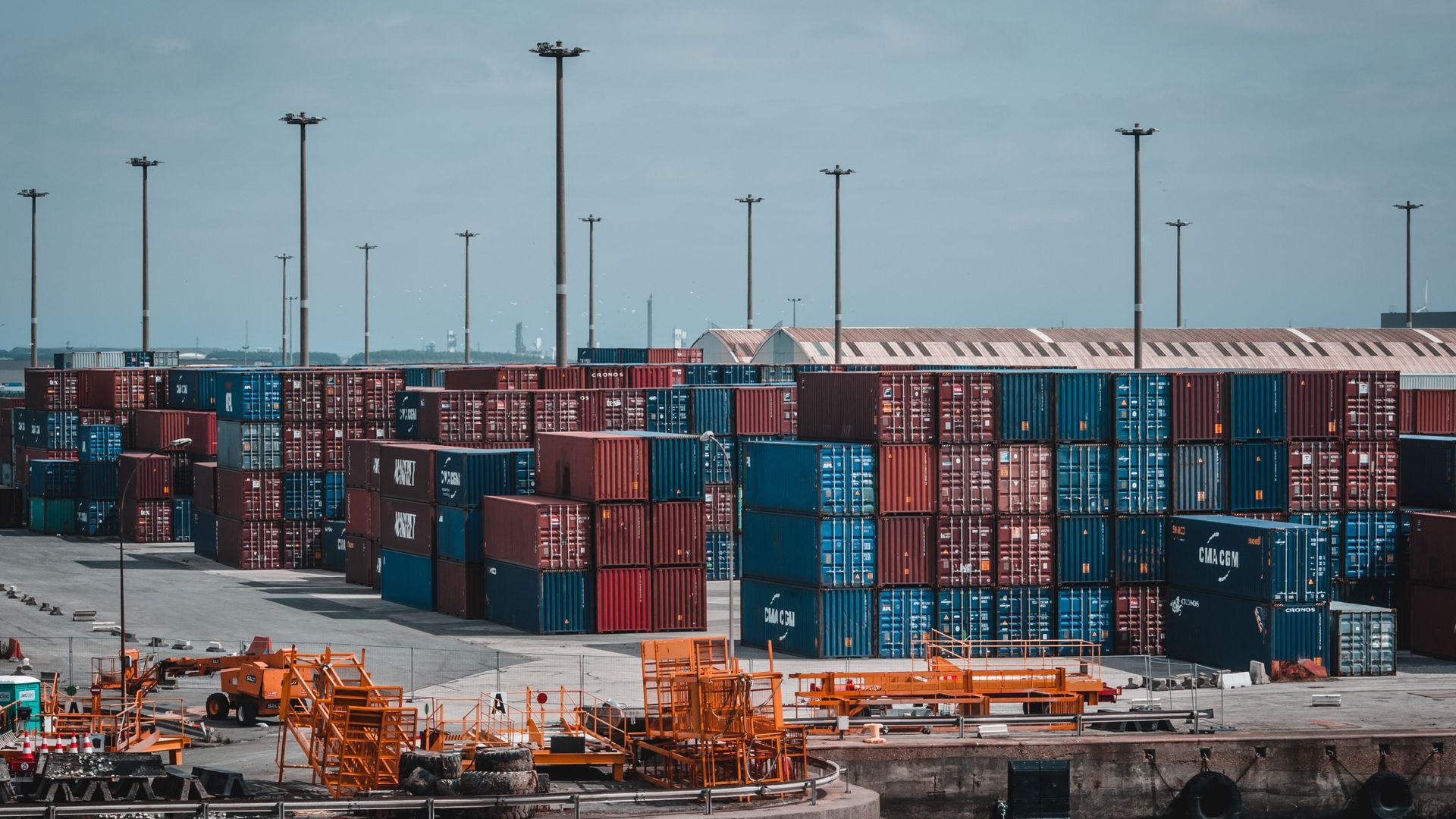 Intermodal shipping containers stacked at a port