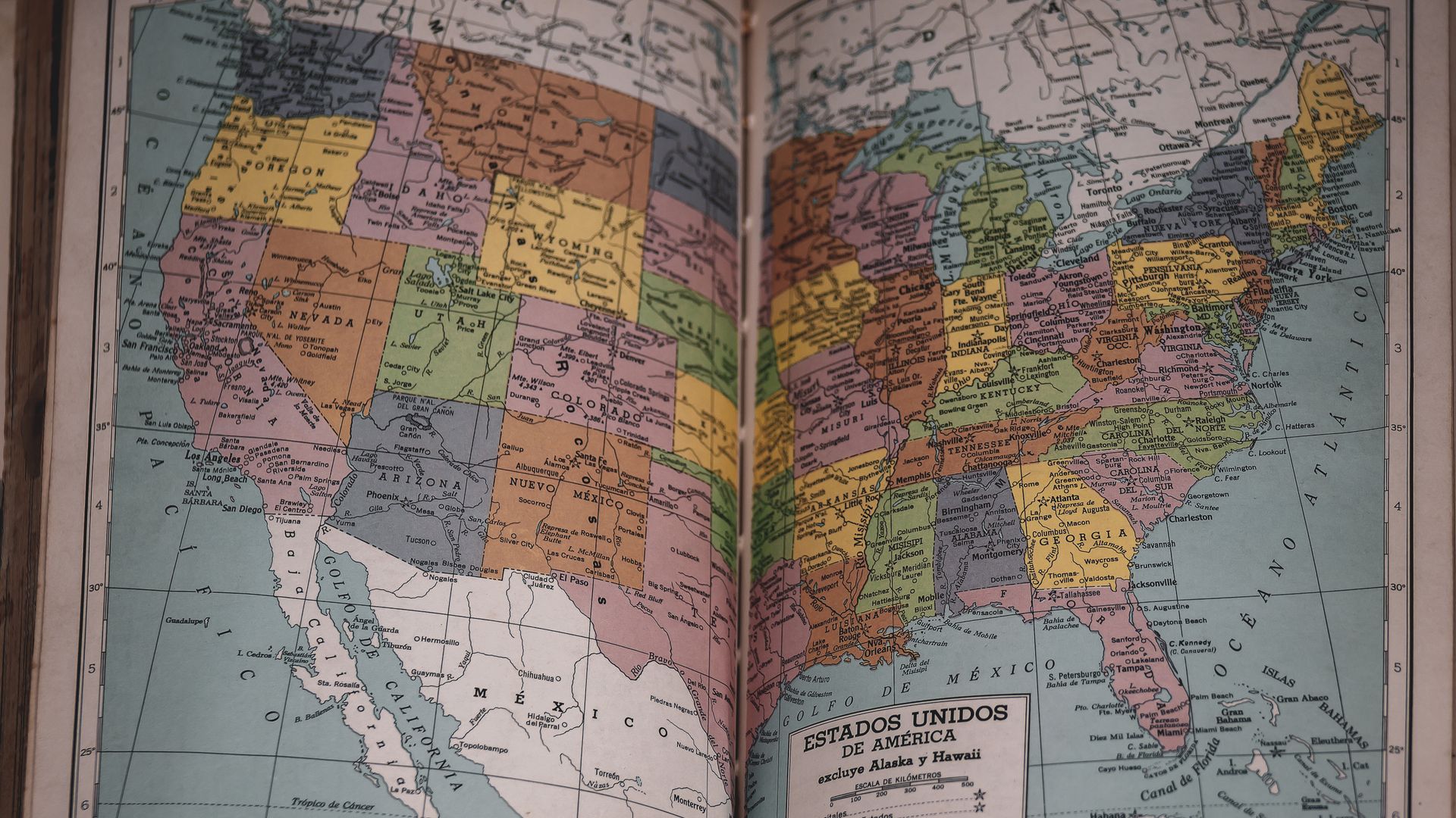 Open atlas showing a map of the United States
