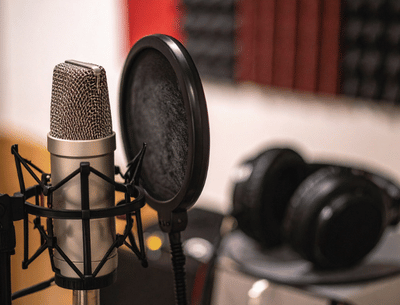 Microphone, headphones and sound insulation board.