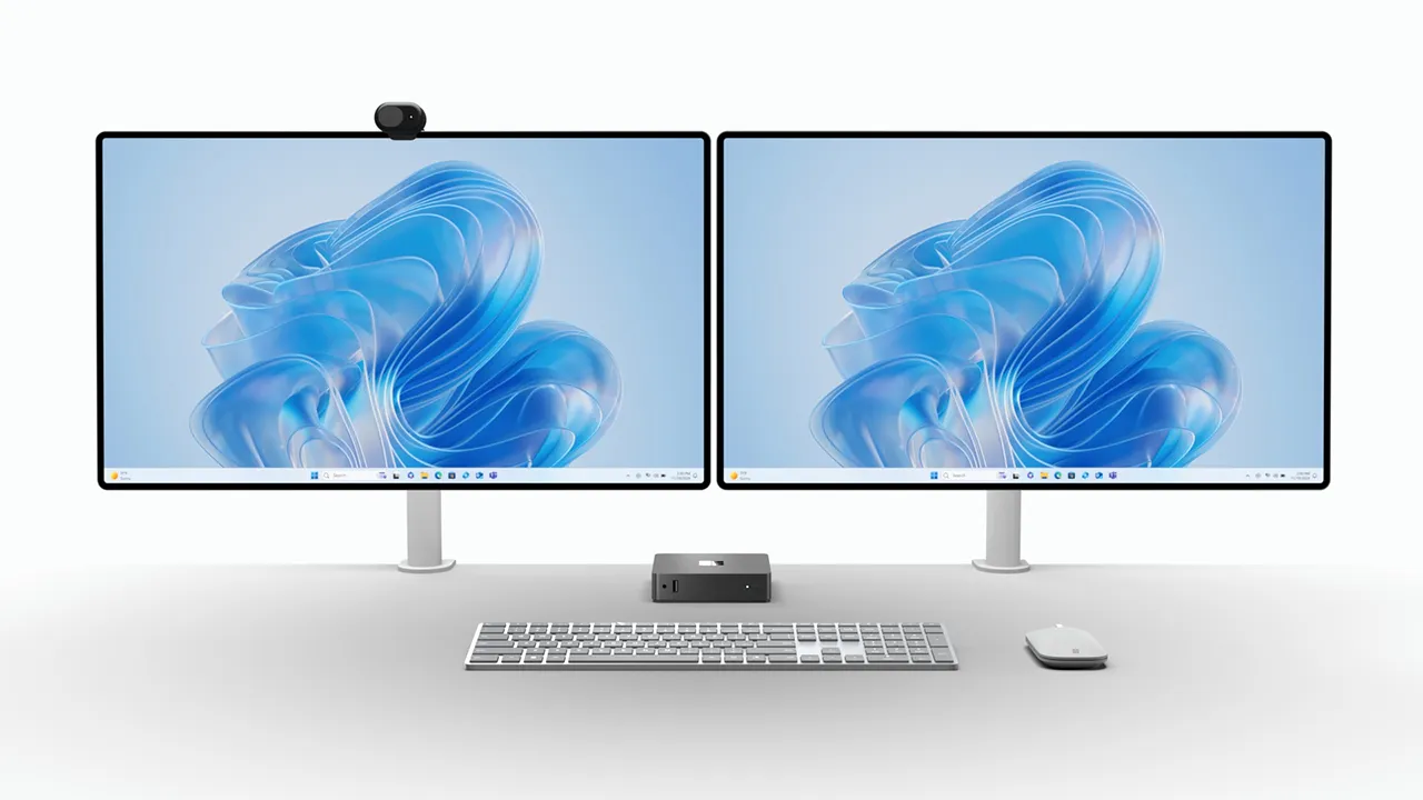 Zwei Monitore, die mit einem Windows Link Gerät verbunden sind.