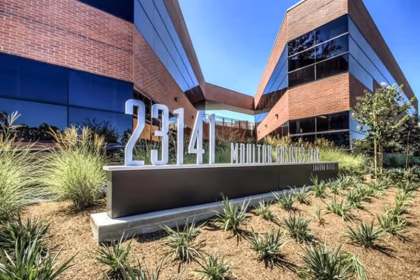 The modern brick exterior of the RMA Southern California - Laguna Hills fertility clinic in Moulton Business Park.