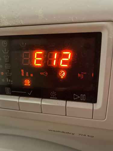 十年老機煥發新生:西門子WD系列洗衣機E12故障碼處理實例 ⚡
