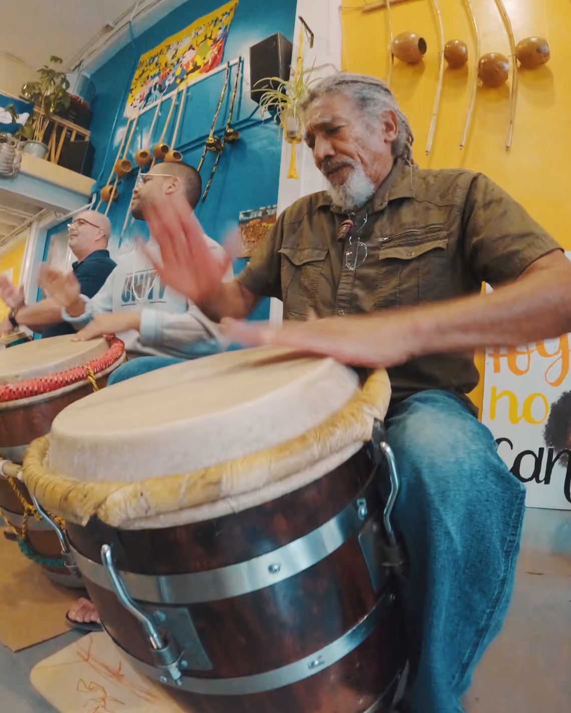 Man playing african drum