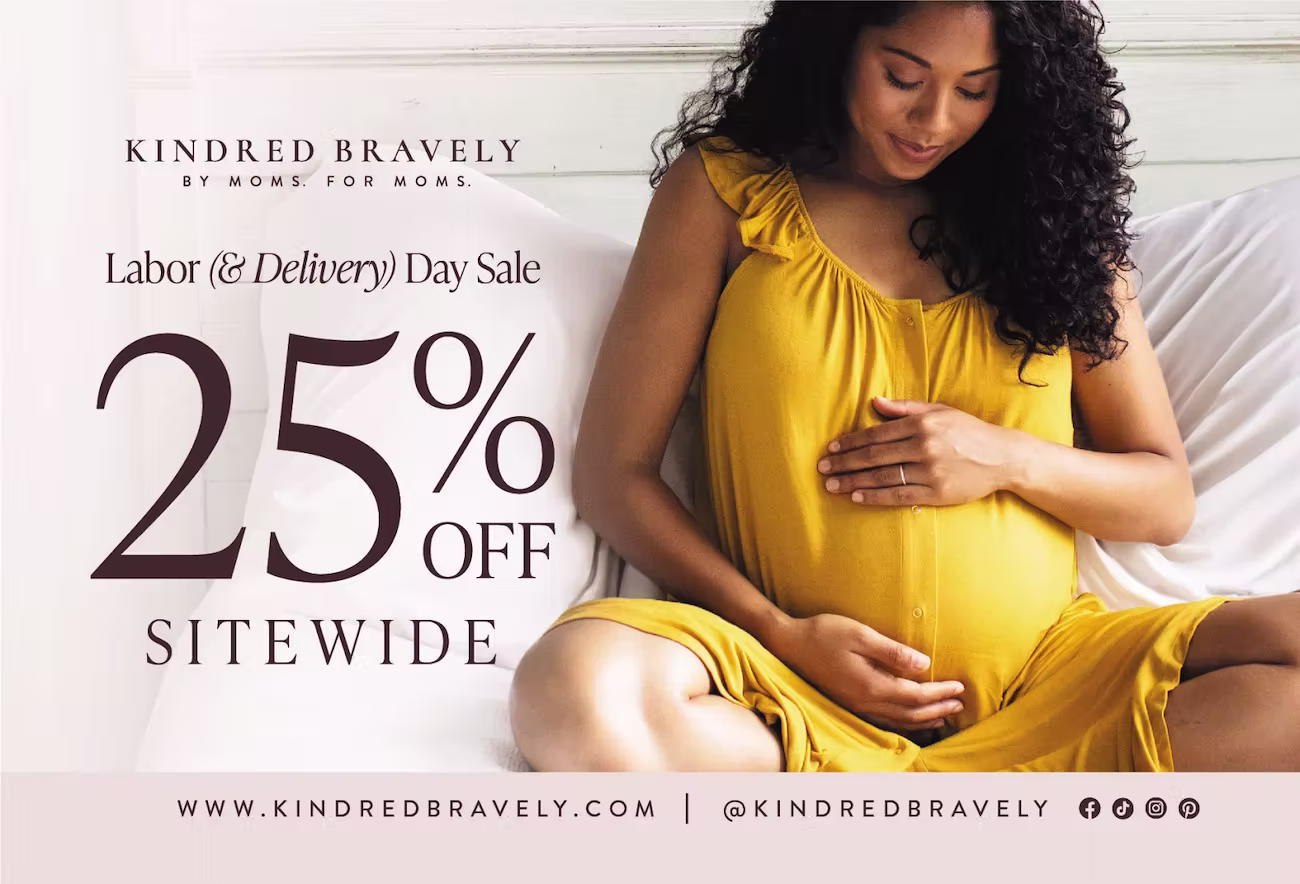 A warm-toned promotional postcard featuring a pregnant woman in a mustard yellow dress resting her hands on her belly. Text on the left reads: “Kindred Bravely – By Moms. For Moms. Labor (& Delivery) Day Sale – 25% OFF Sitewide.” Footer includes the website and social handles: kindredbravely.com | @kindredbravely.