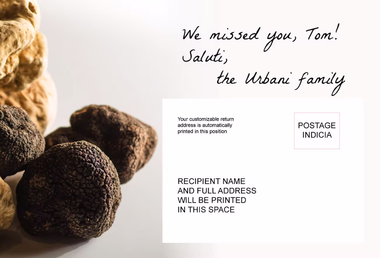 A personalized postcard from Urbani Truffles. The left side displays a close-up photo of fresh black and white truffles. The right side contains handwritten-style text that reads: “We missed you, Tom! Saluti, the Urbani family.” Below that is a mockup of a return address and recipient area for printing, with a "Postage Indicia" box.