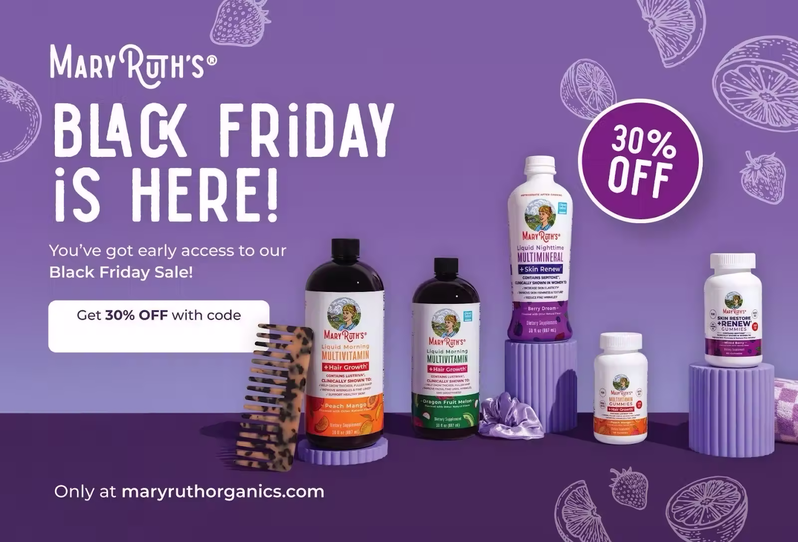 MaryRuth’s Black Friday postcard with a purple background and fruit illustrations. Headline reads “Black Friday Is Here!” A row of MaryRuth’s supplements is arranged on purple pedestals.