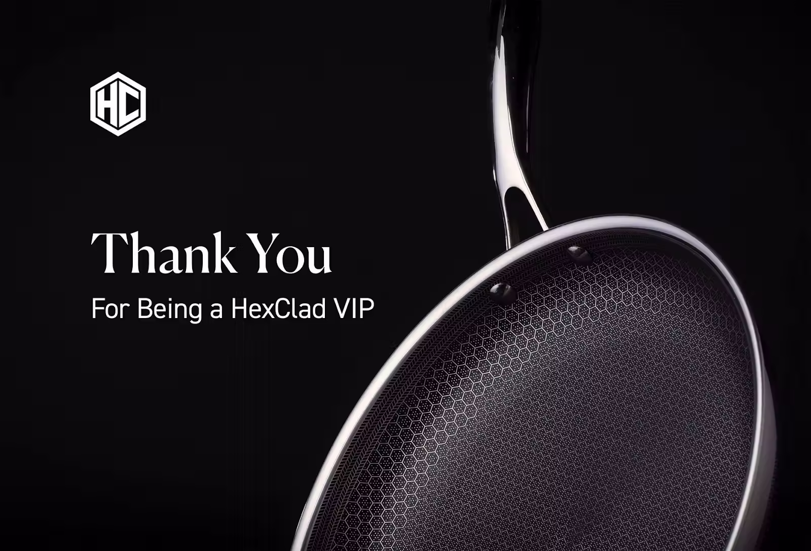 Close-up of a HexClad pan with signature hexagonal texture against a black background. Text: "The Black Friday Sale — Take up to 40% off."