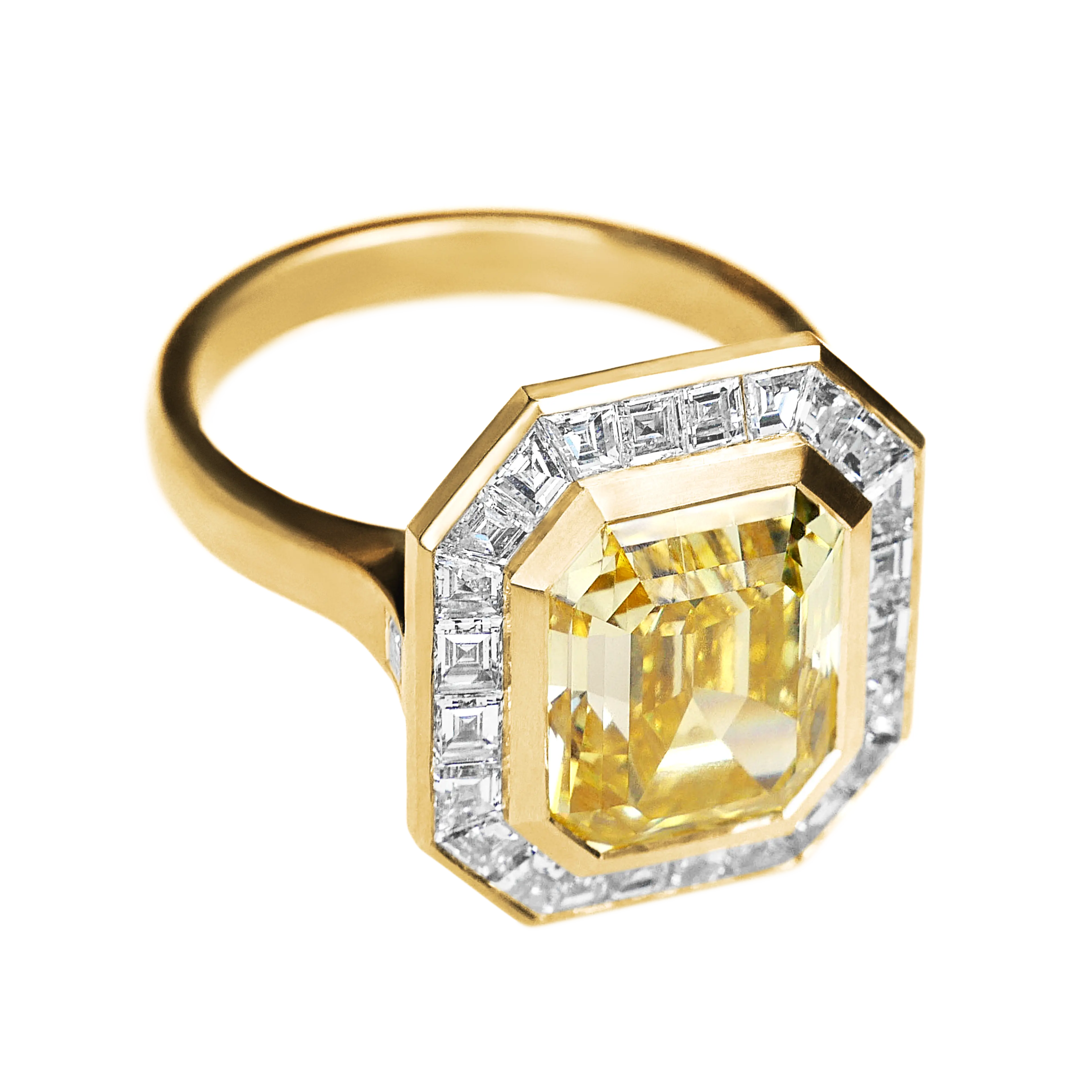 An angled top view of the yellow diamond ring