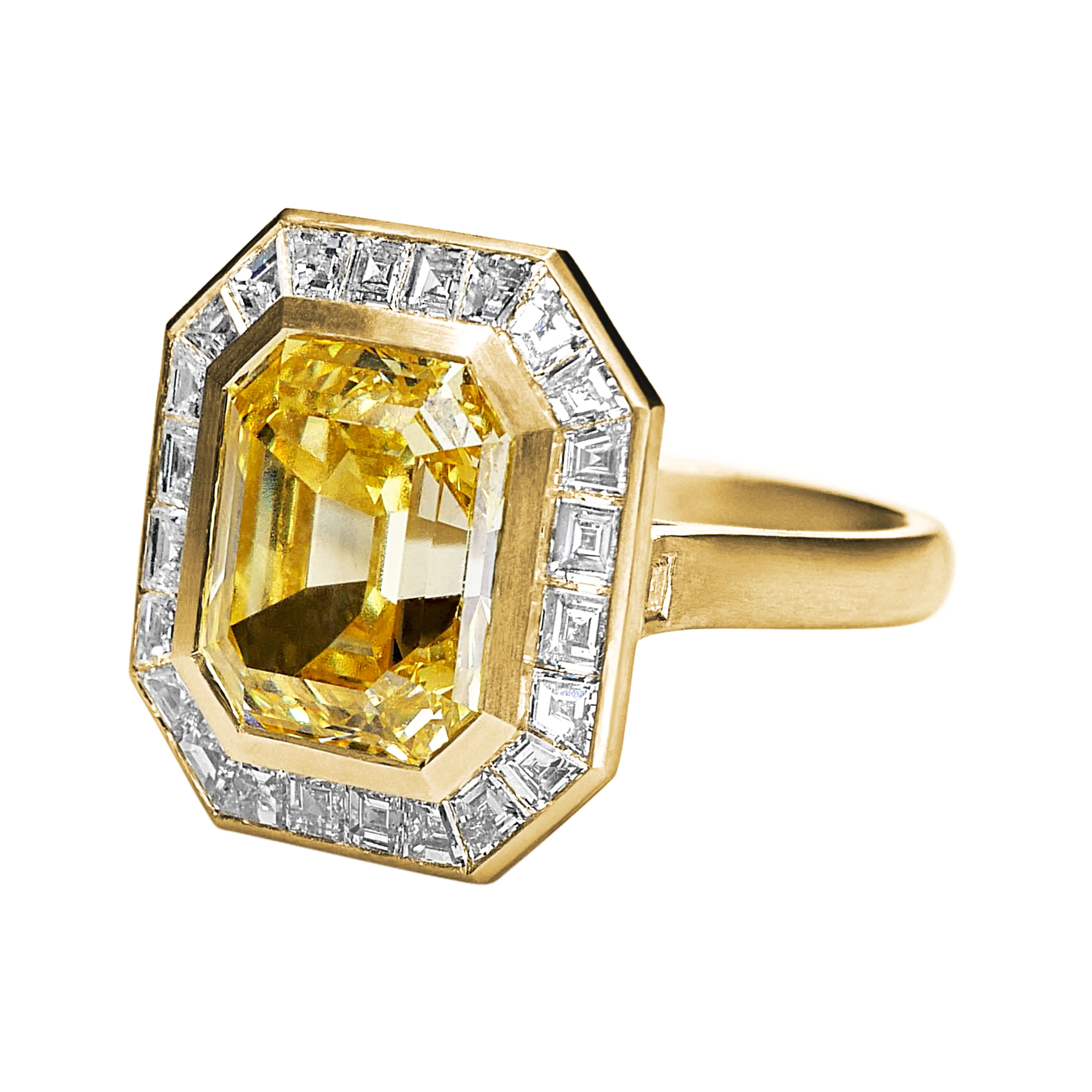 An angled front view of the yellow diamond ring