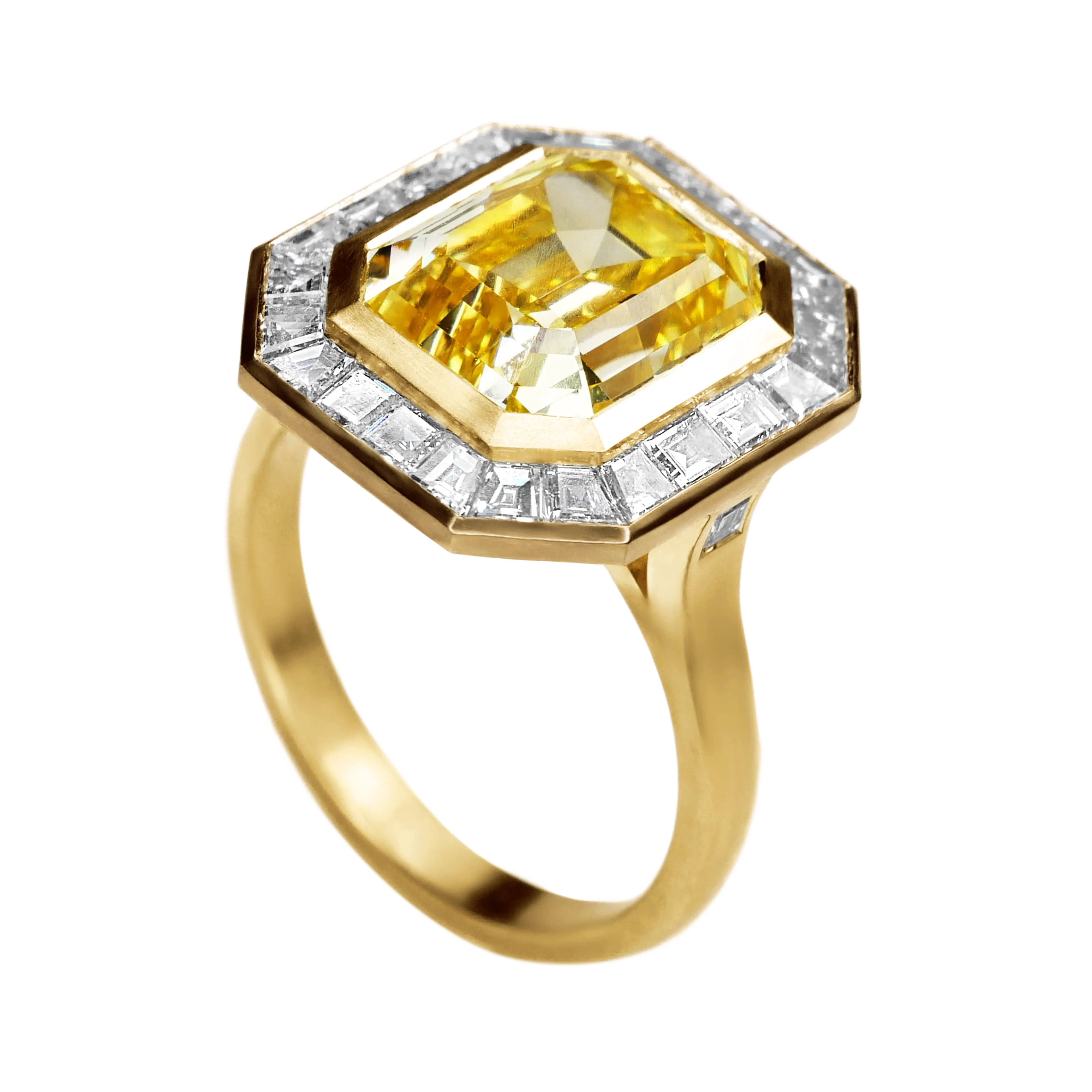 An angled side view of the yellow diamond ring