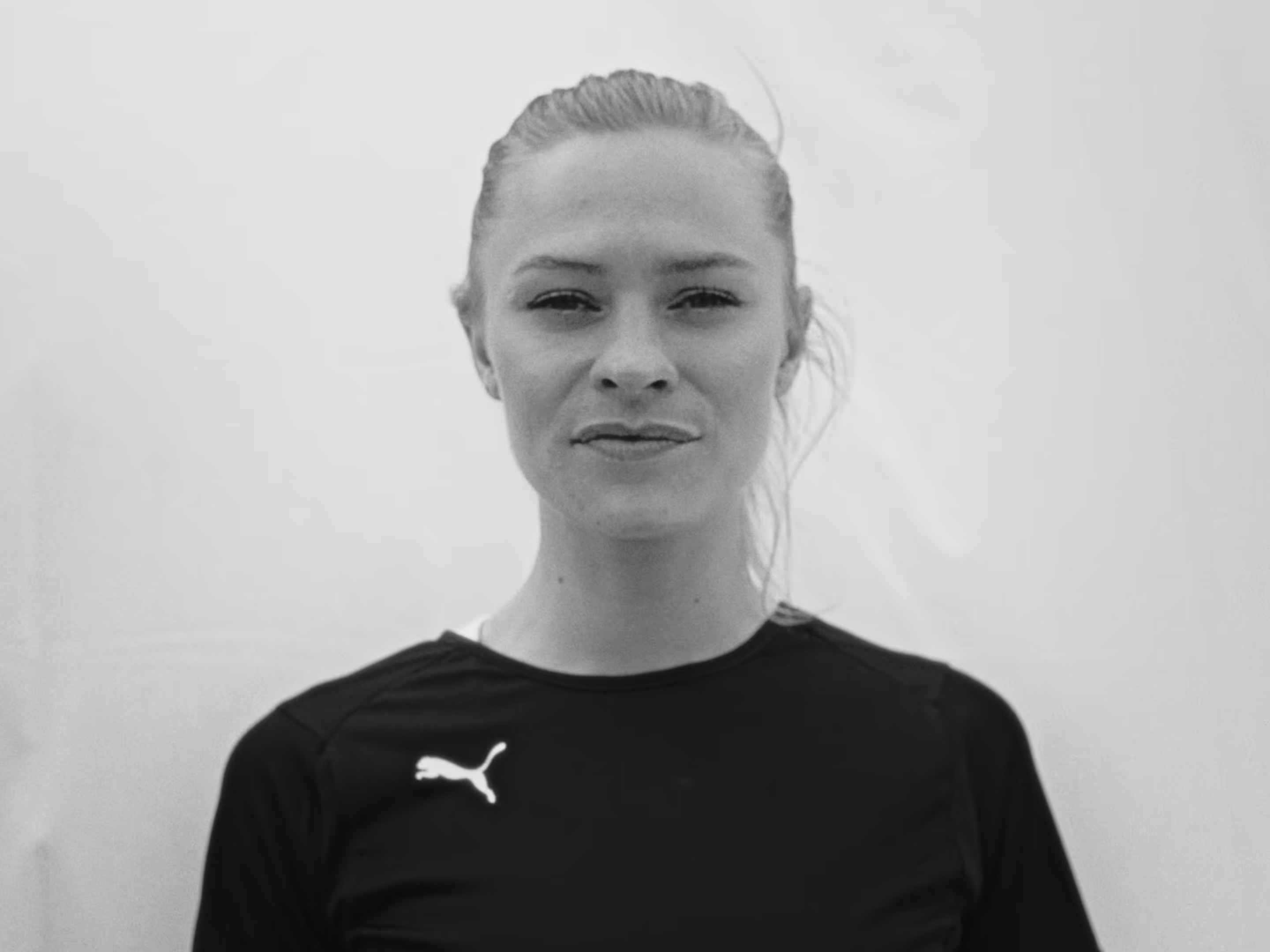 FC Barcelona player Fridolina Rolfö looks into the camera.