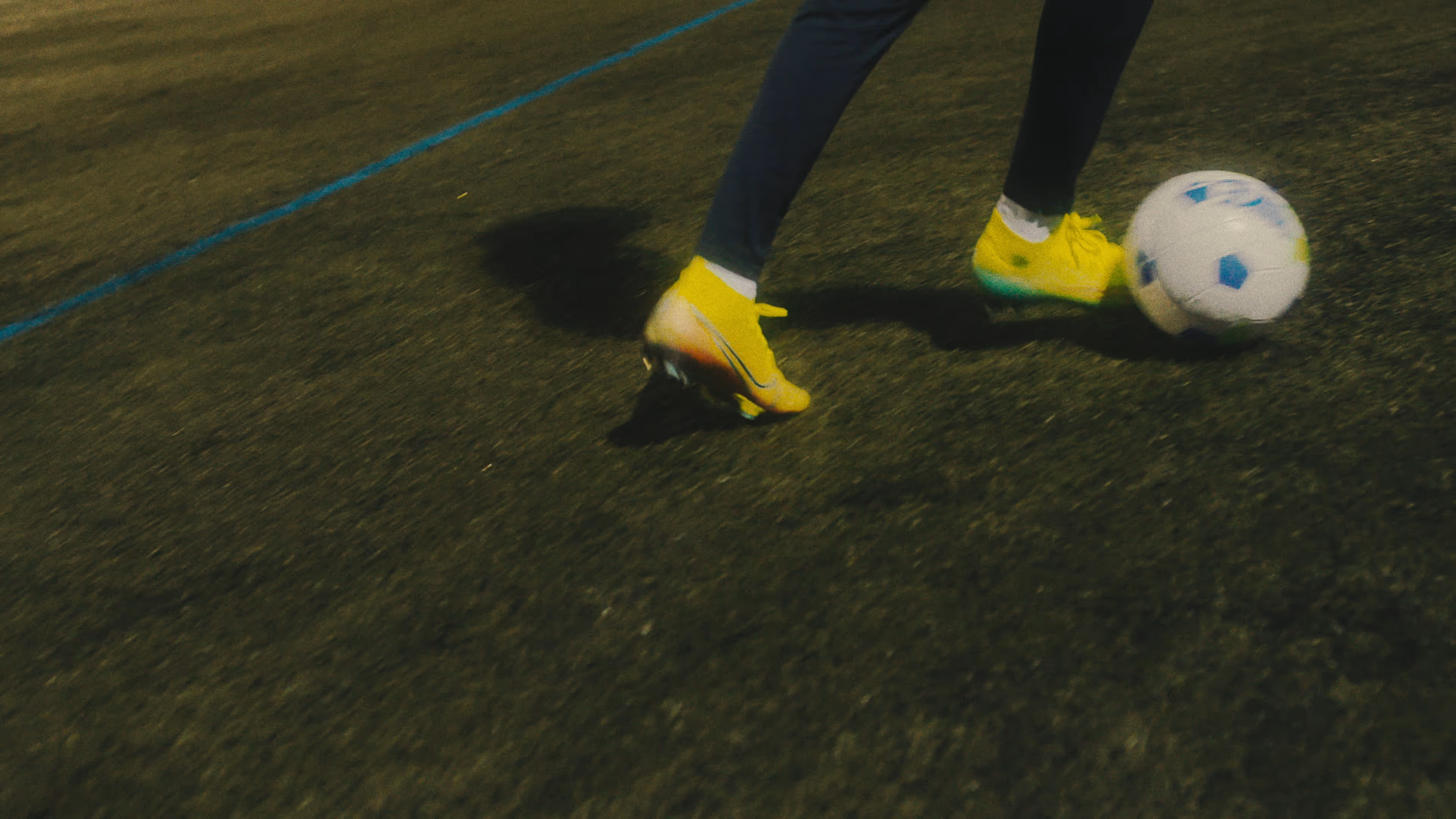 A football player from A.S. Bondy dribbles.