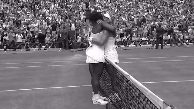 Two tennis player hug each other after a final.